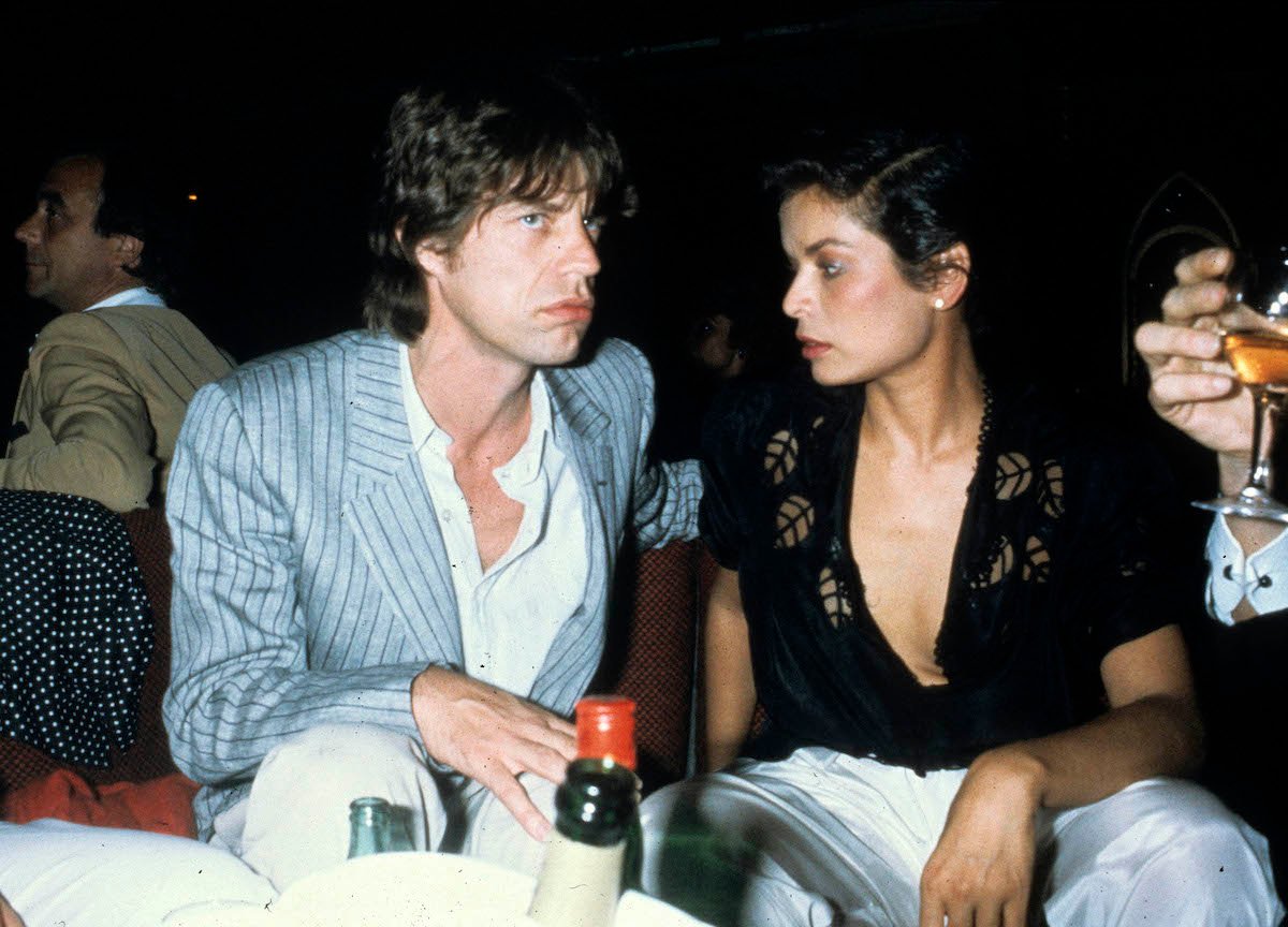Mick Jagger of The Rolling Stones and Bianca Jagger attend a party at the night club le78 in 1982 in Paris, France | Michel Dufour/WireImage