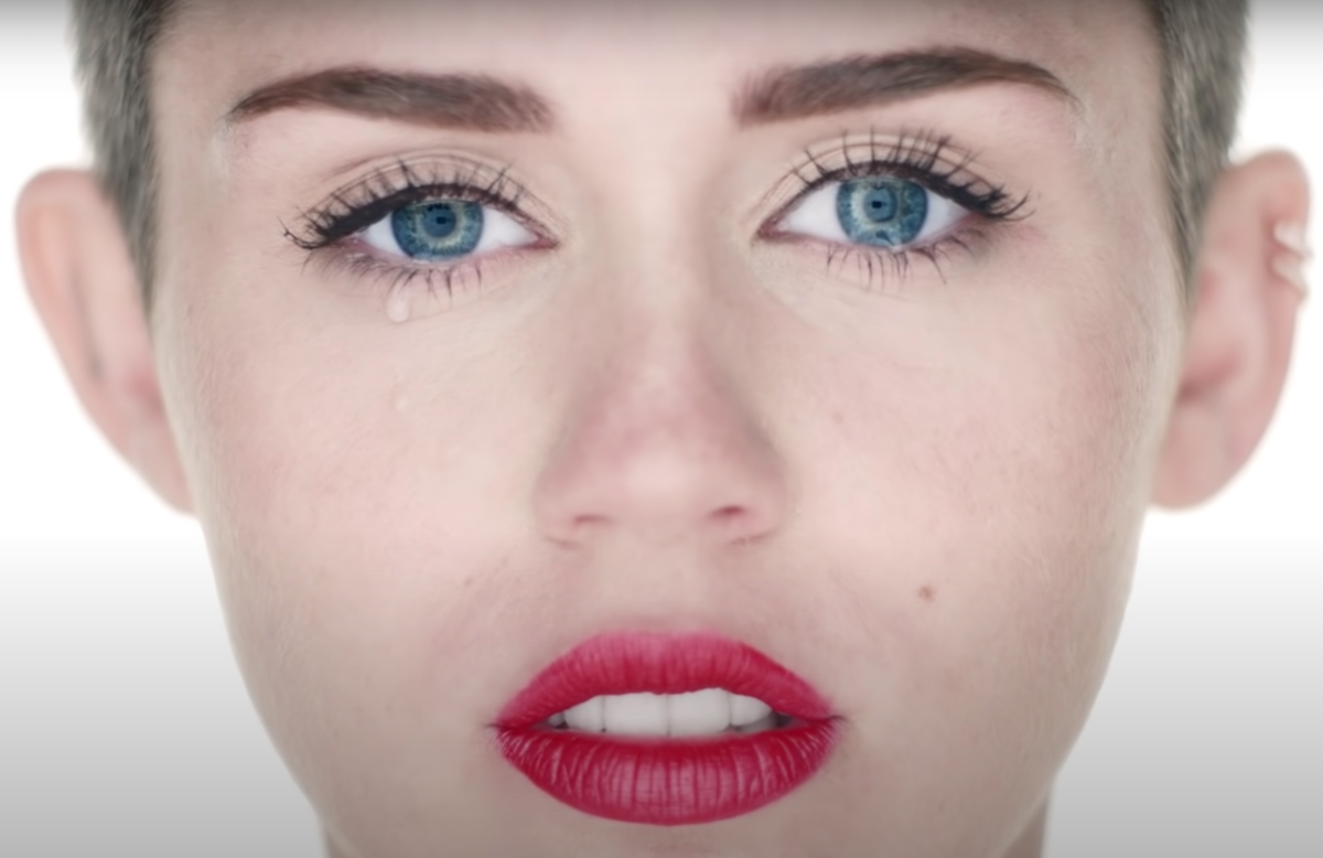 Closeup shot of Miley Cyrus crying in the 'Wrecking Ball' music video | YouTube
