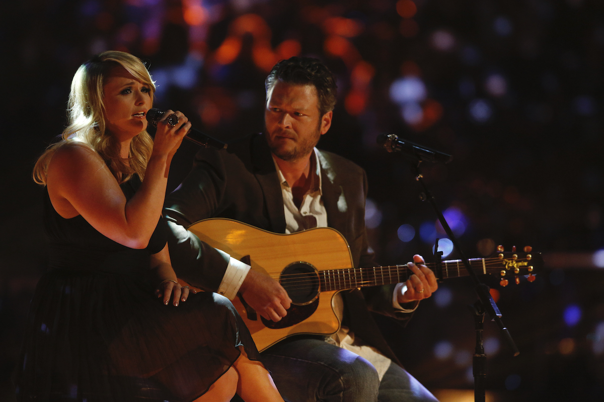 Miranda Lambert and Blake Shelton sit down performing on stage on 'The Voice'