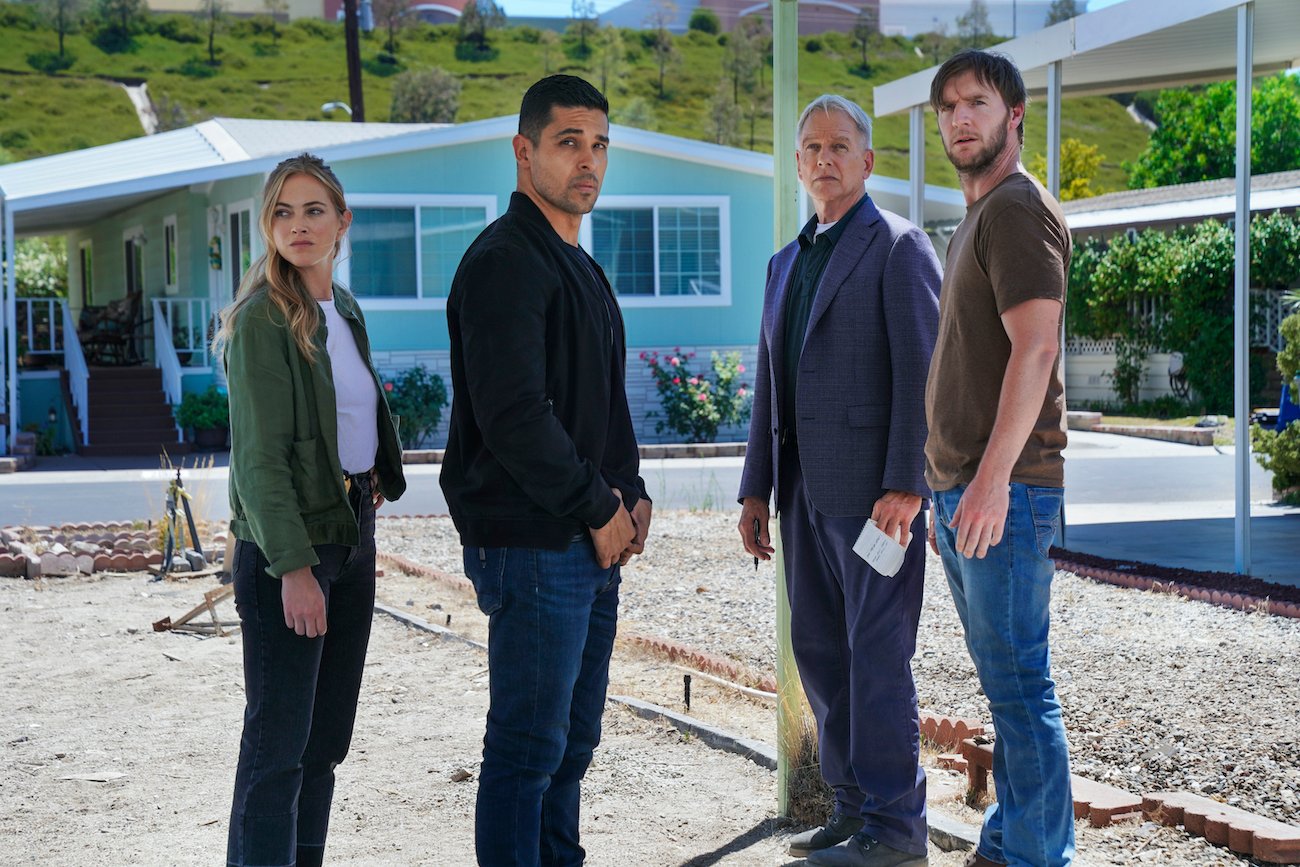 NCIS cast on set, Emily Wickersham, Mark Harmon, Wilmer Valderrama, and Cliff Chamberlain as Peter Buck
