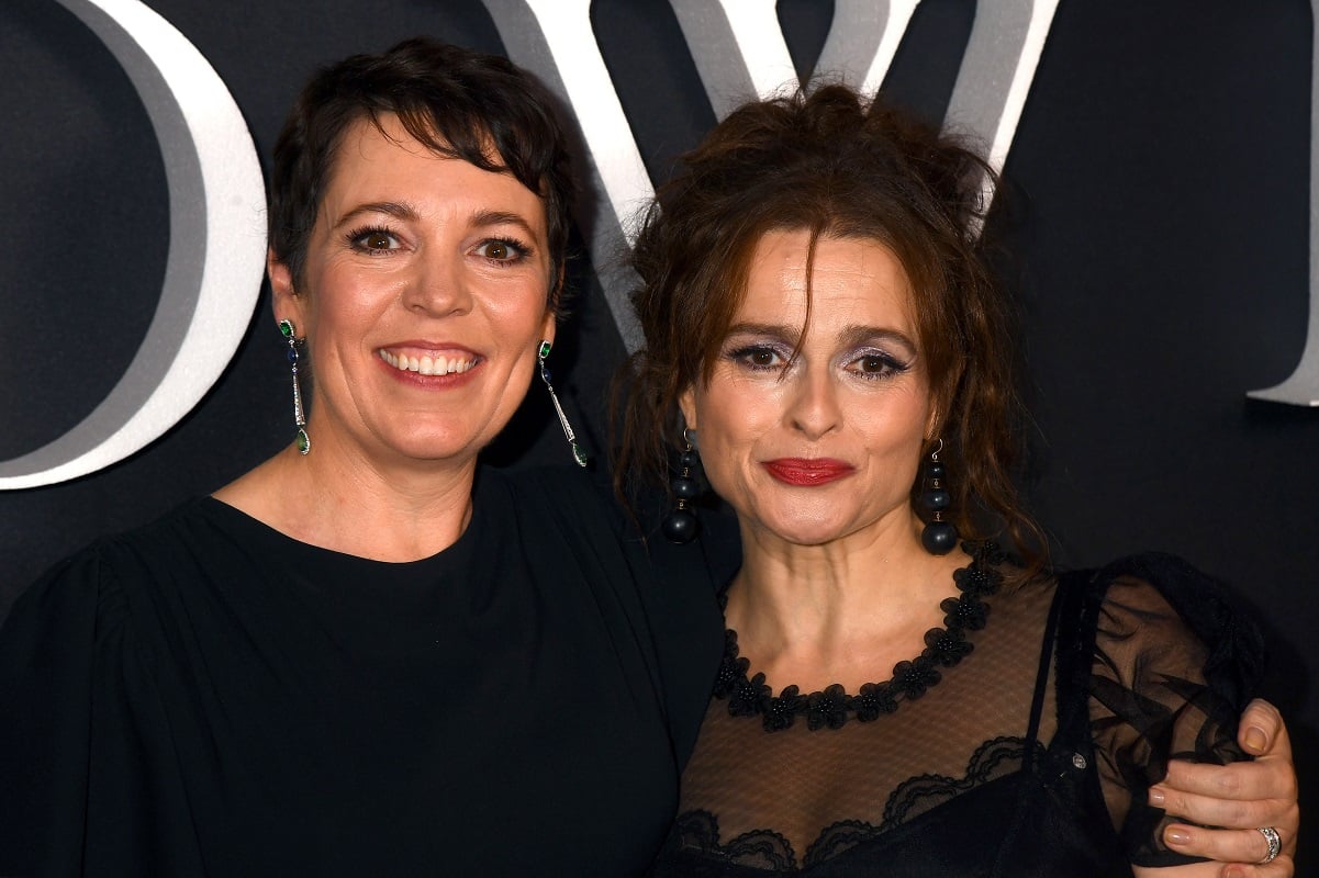 Olivia Colman and Helena Bonham Carter smiling together at The Crown season 3 premiere