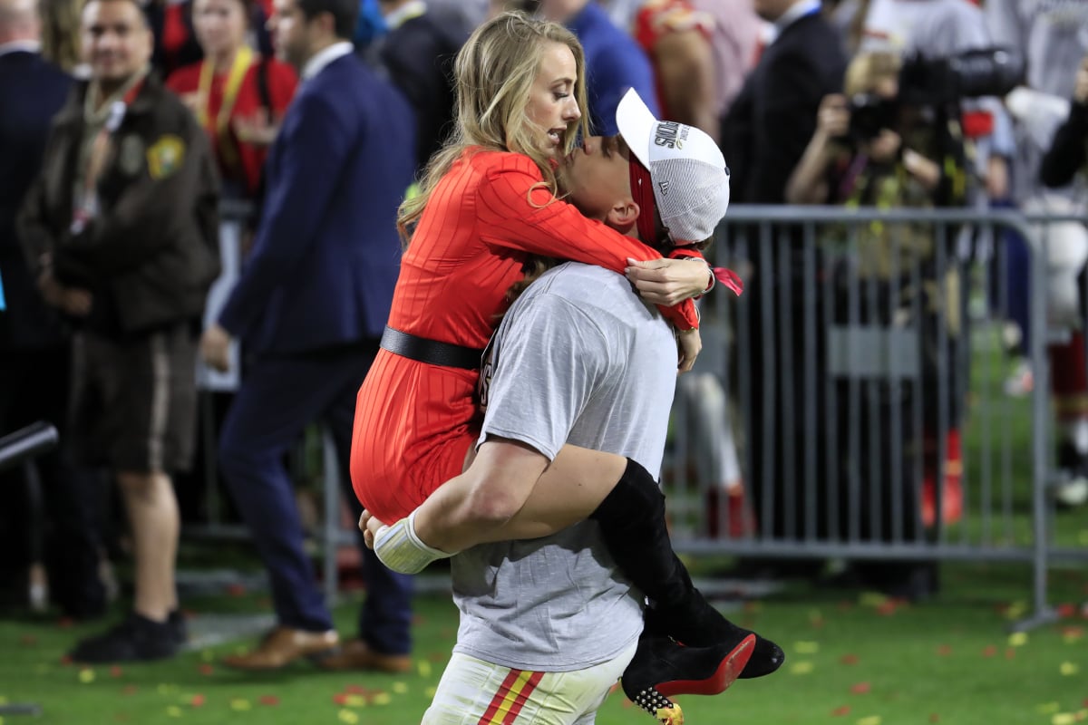 Patrick Mahomes #15 of the Kansas City Chiefs celebrates with his girlfriend, Brittany Matthews, after defeating the San Francisco 49ers 31-20 in Super Bowl LIV at Hard Rock Stadium on February 02, 2020
