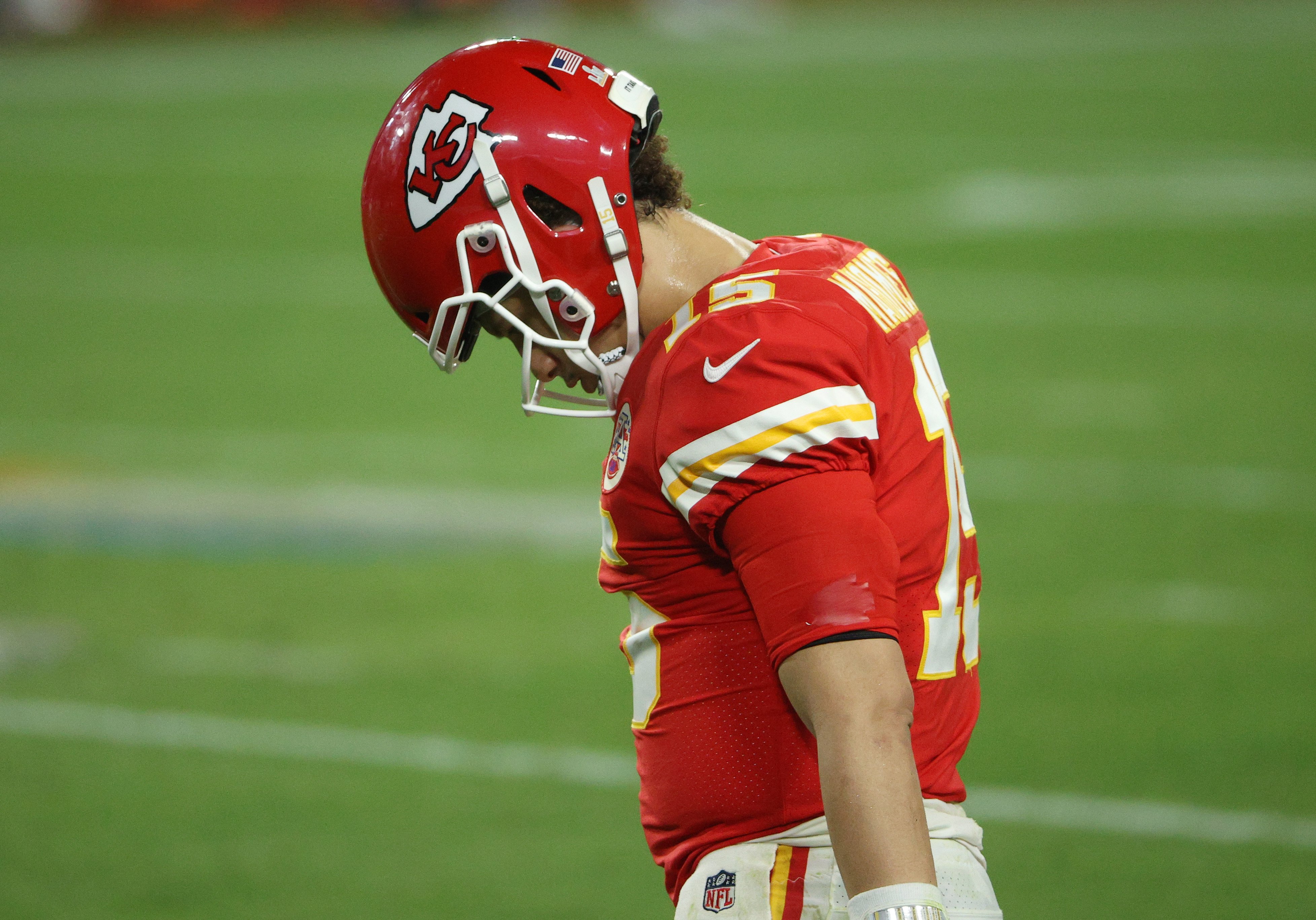 Patrick Mahomes walks with his head down in Super Bowl 55