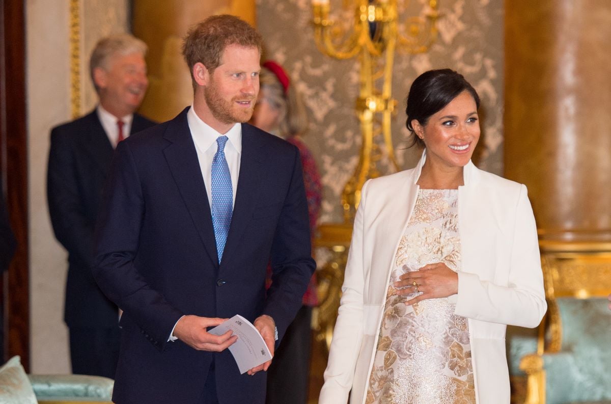 Prince Harry, Duke of Sussex and Meghan, Duchess of Sussex attend a reception to mark the fiftieth anniversary of the investiture of the Prince of Wales at Buckingham Palace