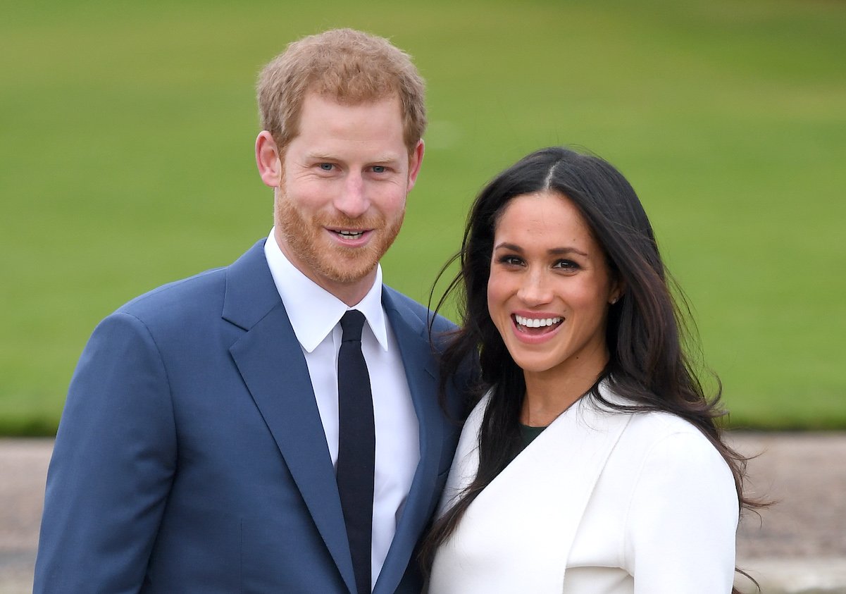 Prince Harry and Meghan Markle pose for photos after announcing their engagement in November 2017.
