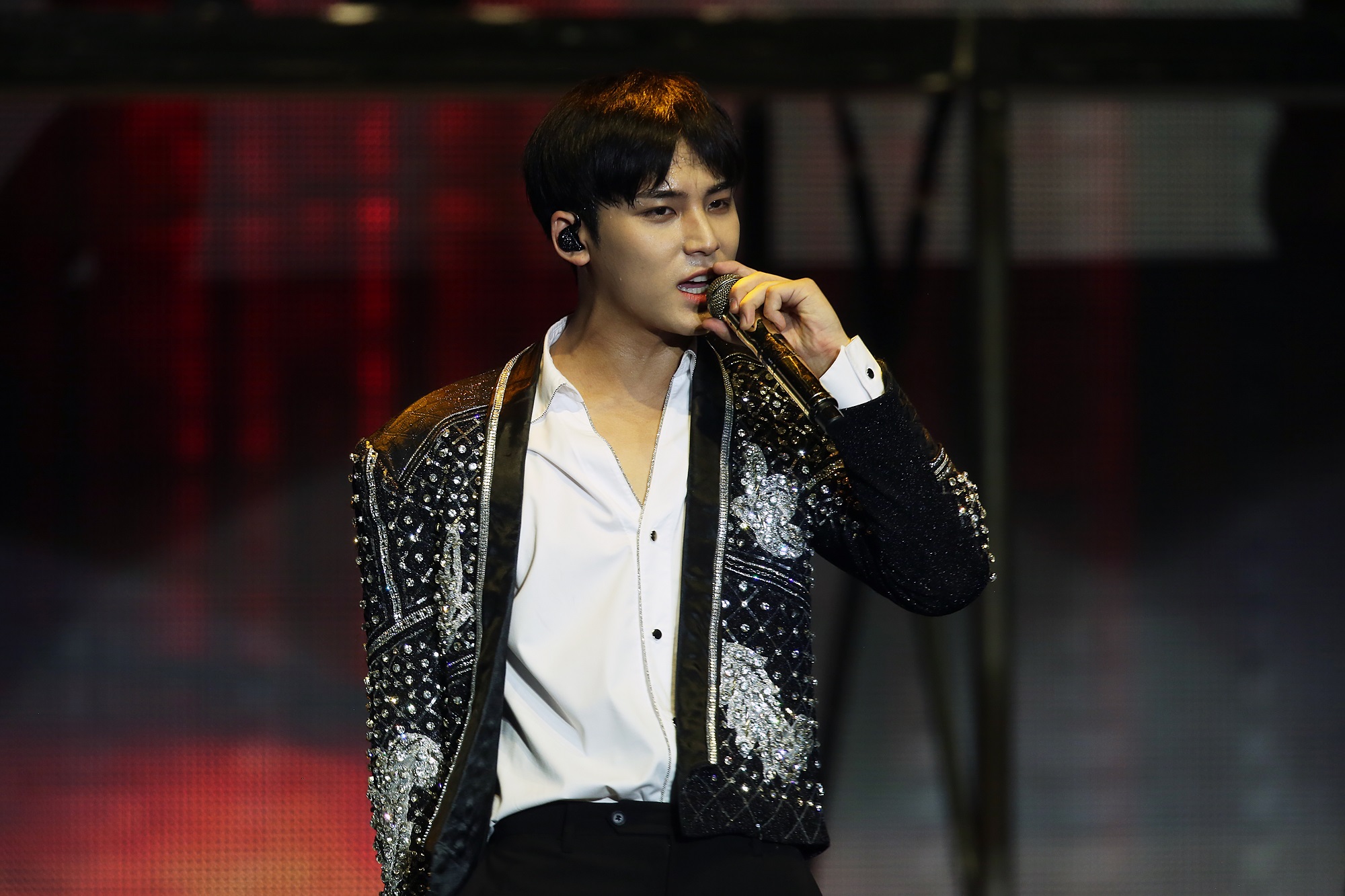 Mingyu of SEVENTEEN performing during the band's Ode to You tour in 2020