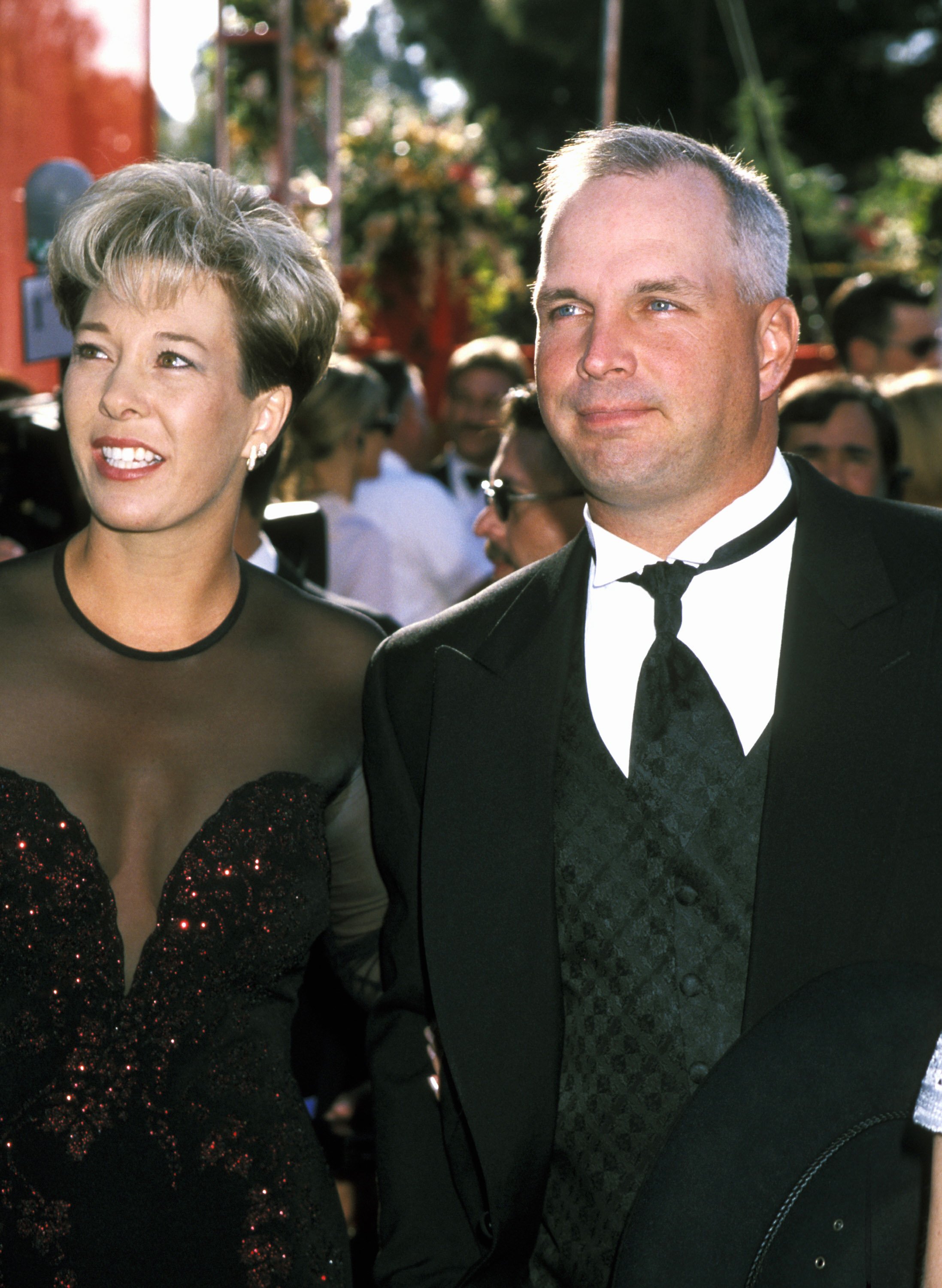 Garth Brooks with wife Sandy Mahl smiling together at the Academy Awards