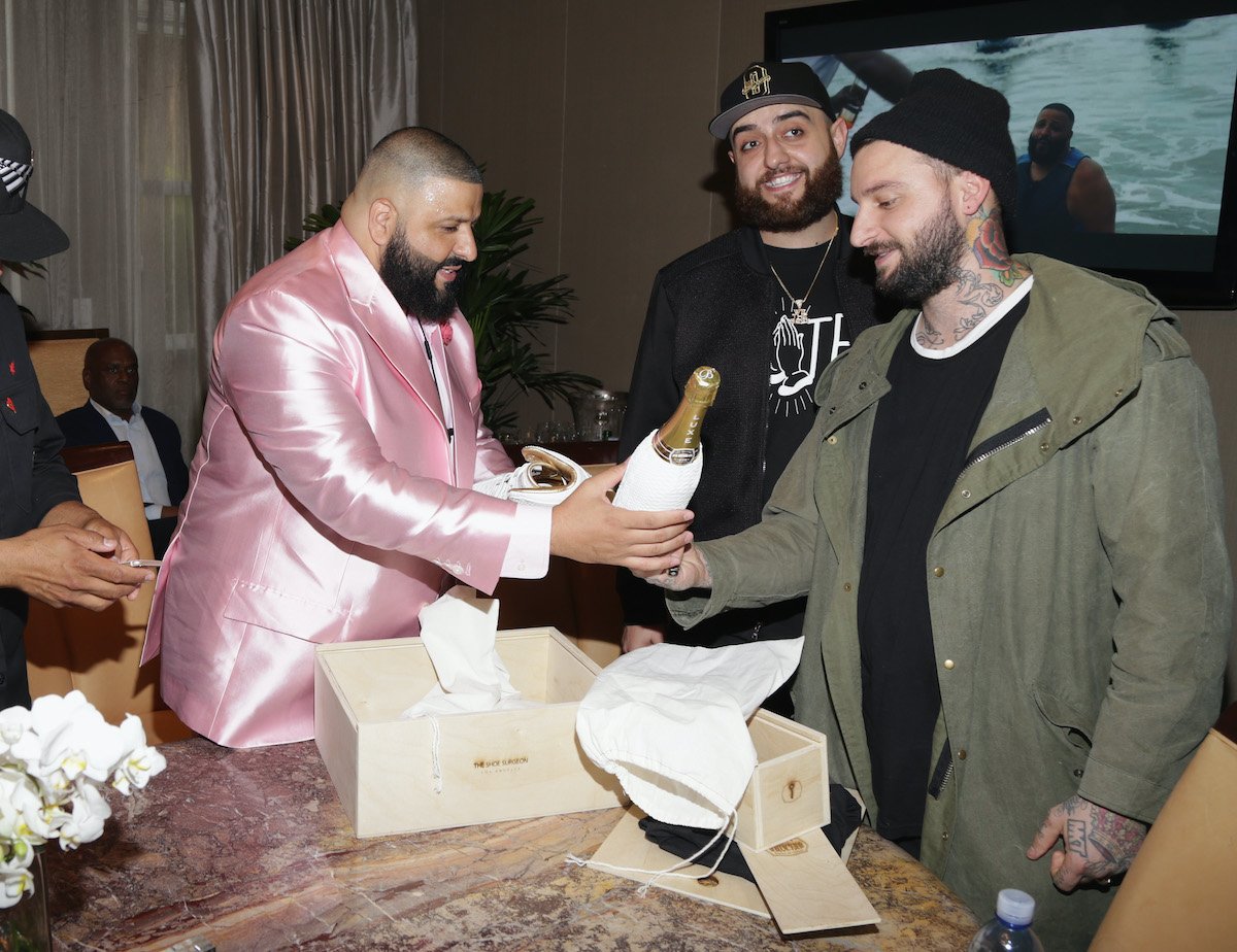 DJ Khaled receives a custom pair of Jordans from Dominic Chambrone aka The Shoe Surgeon at DJ Khaled Special Announcement Press Conference