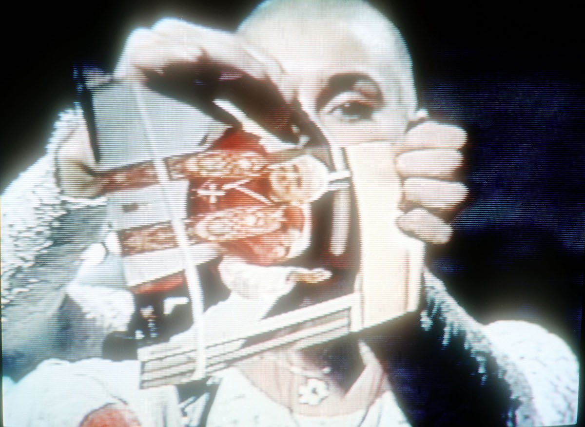 Video capture of singer Sinéad O'Connor ripping up a picture of Pope John Paul II on October 3, 1992, on the TV show 'Saturday Night Live' (AKA 'SNL')