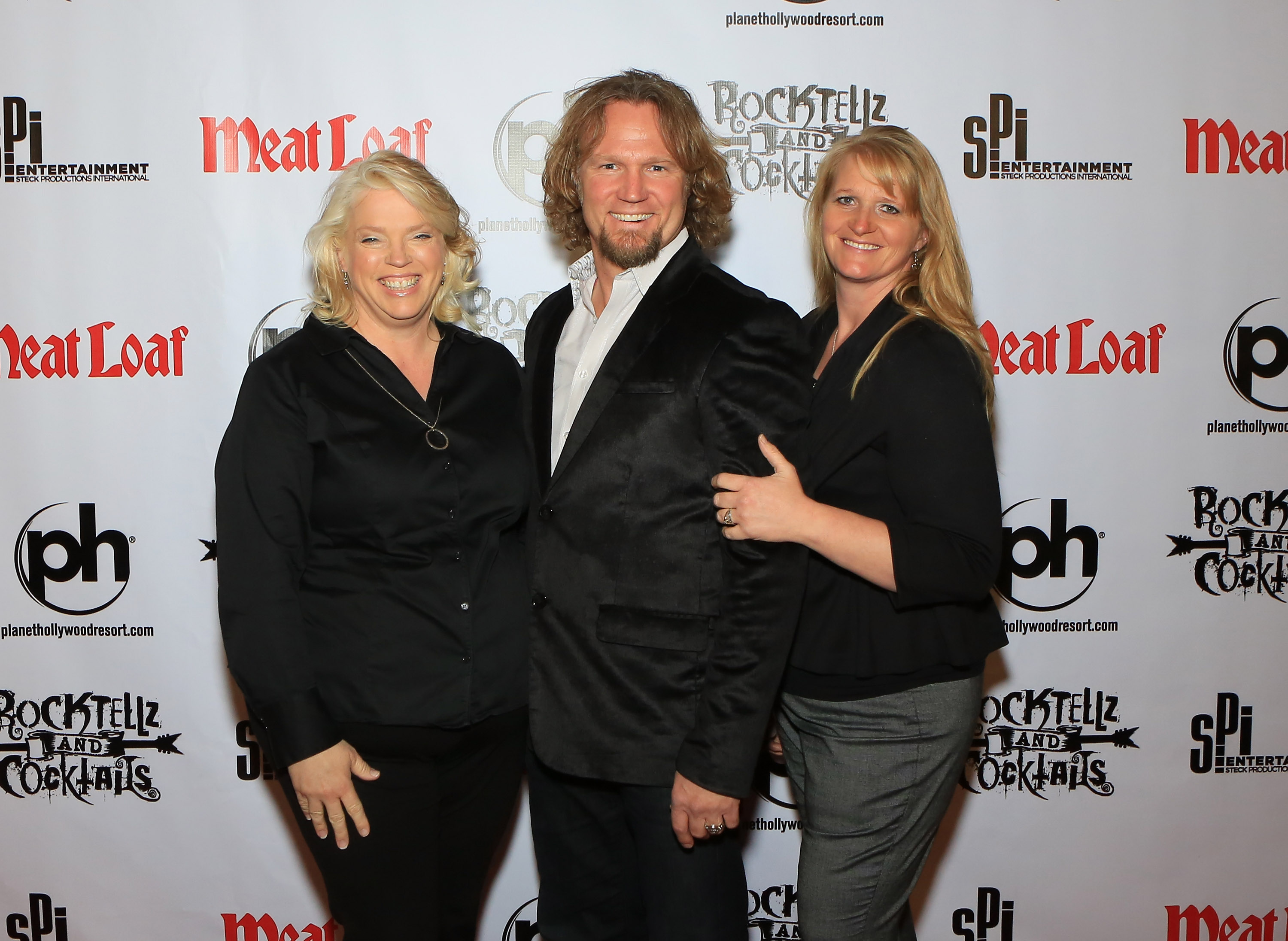 Janell Brown, Kody Brown and Christine Brown post for a photo at Planet Hollywood Resort & Casino during the 'Rocktellz & Cocktails Presents Meat Loaf'
