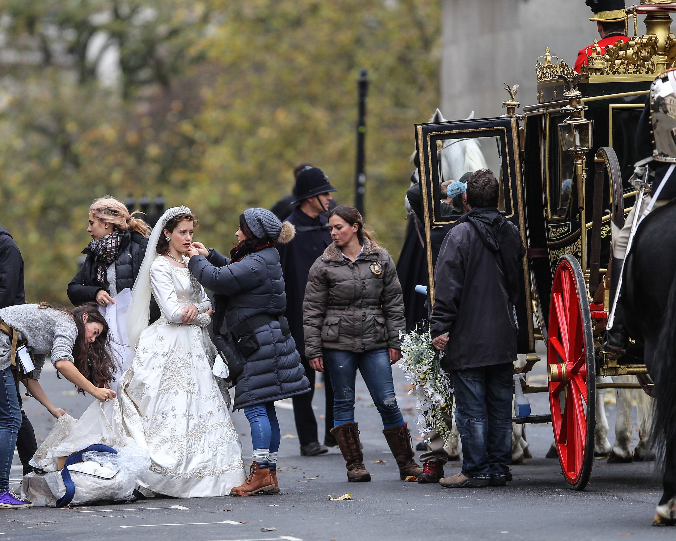 Claire Foy, cast of 'The Crown,' in a wedding dress as a young Queen Elizabeth II