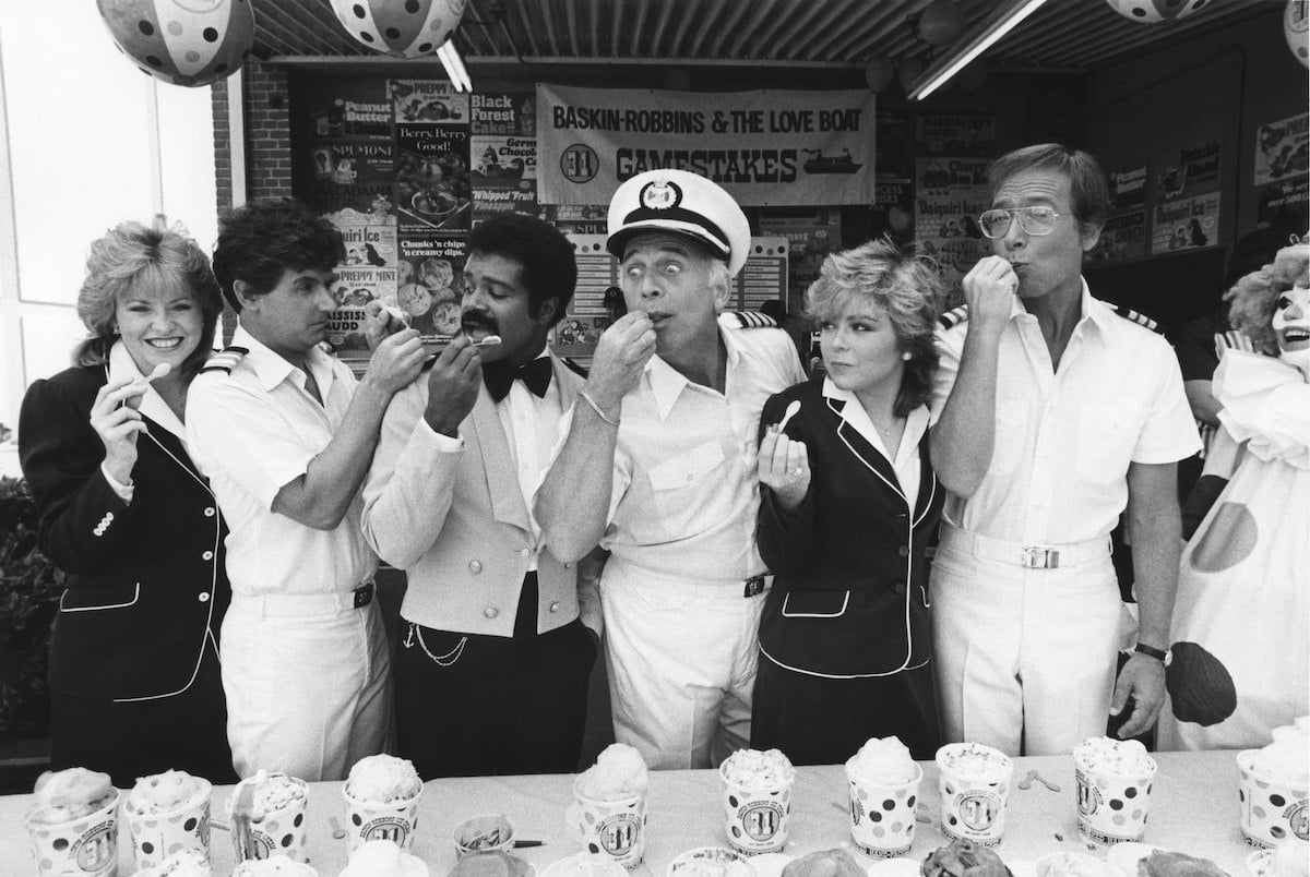 Actors Lauren Tewes (left), Fred Grandy, Ted Lange, Gavin MacLeod, Jill Whelan, and Bernie Kopell of 'The Love Boat' take a break in taping the show to sample some of the 31 flavors from Baskin-Robbins in Los Angeles, California.