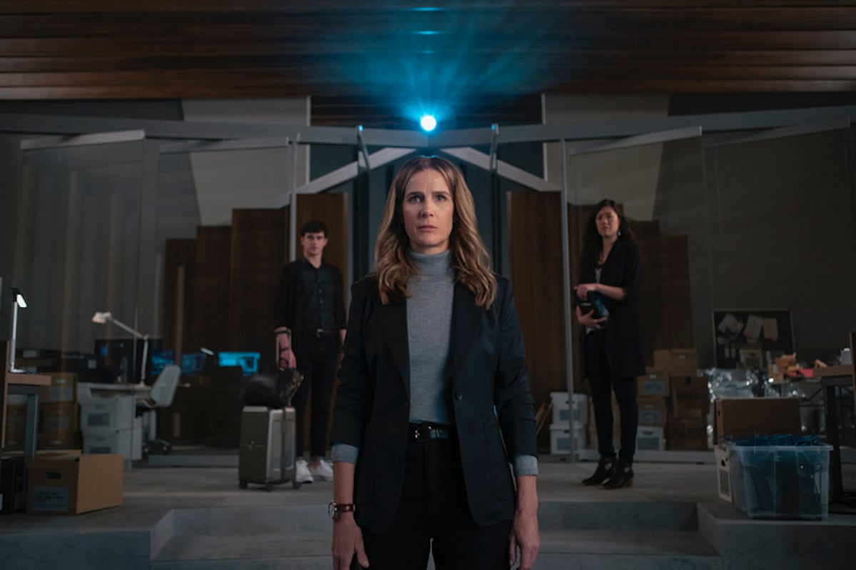 Joe Witkowski as Thom, Rachel Griffiths as Gretchen Klein, and Jen Huang as Susan stand together on 'The Wilds'