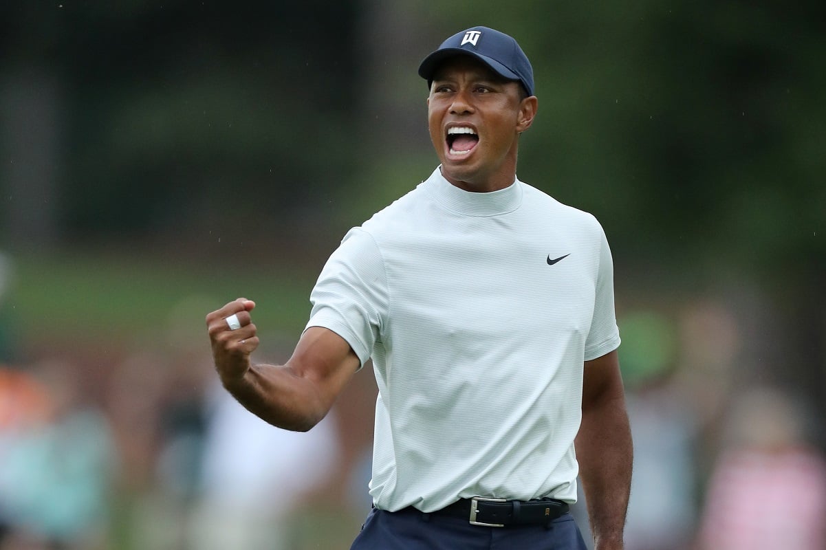 Tiger Woods celebrates after making a putt for birdie at Masters