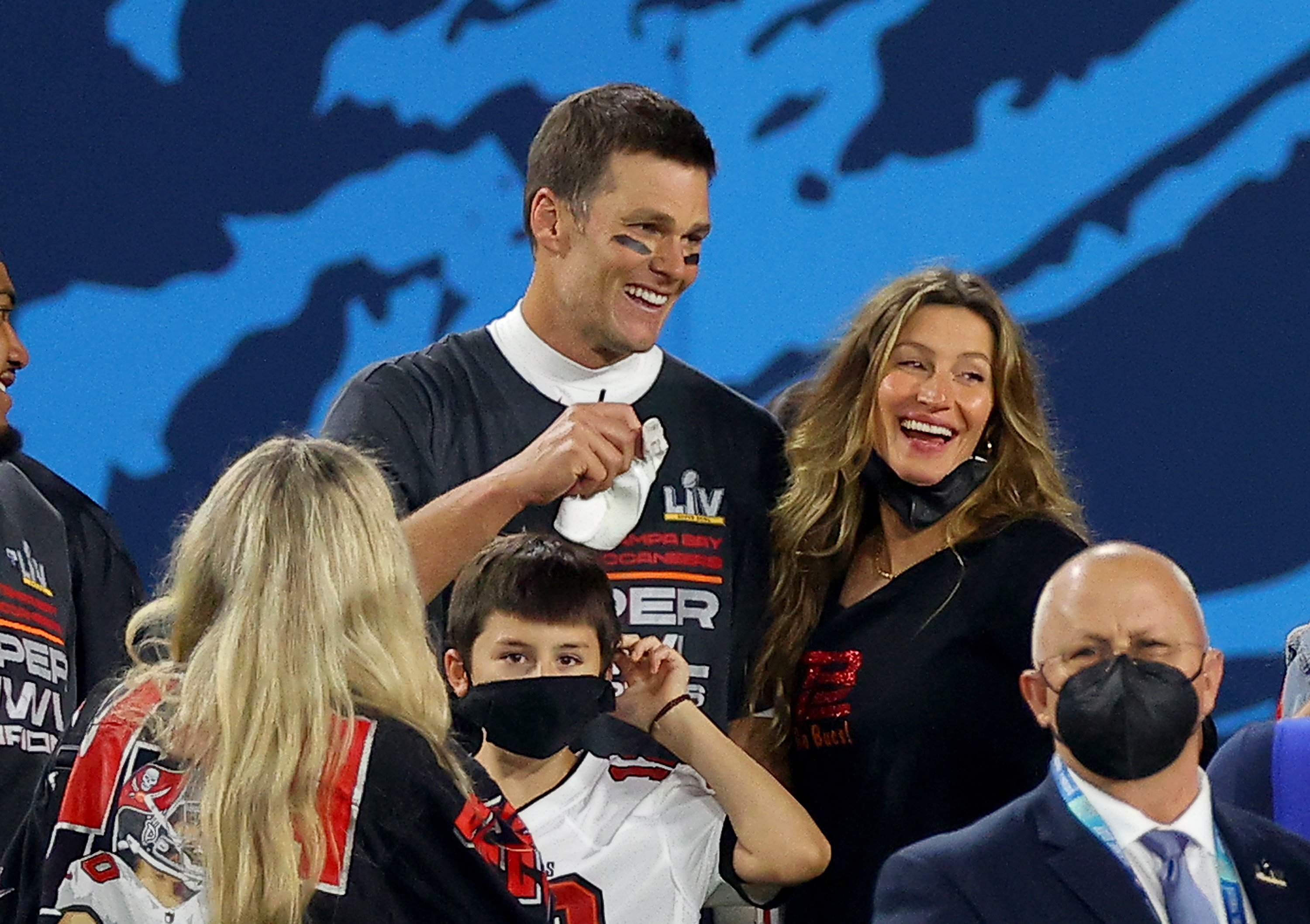 om Brady #12 of the Tampa Bay Buccaneers celebrates with Gisele Bundchen after winning Super Bowl LV