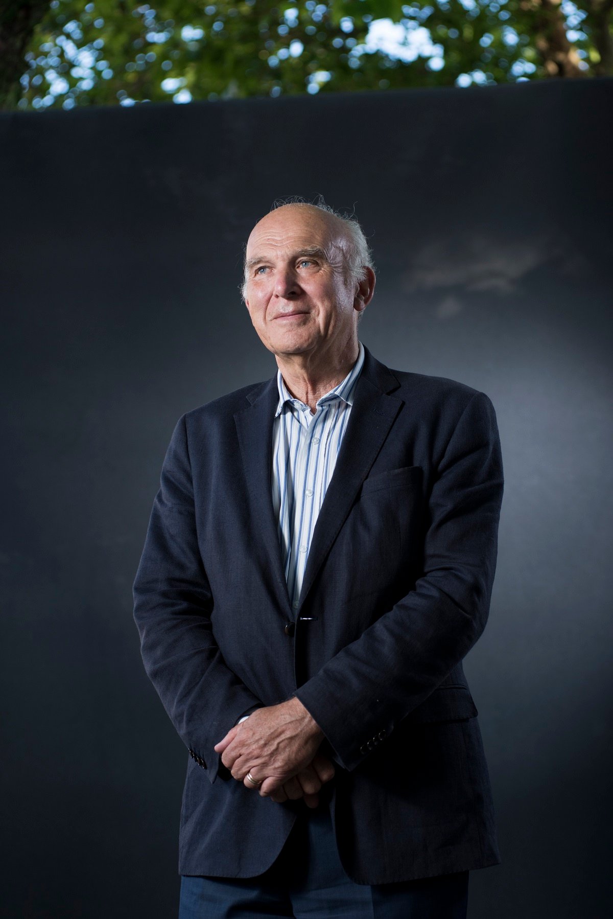 Vince Cable in a standing portrait at the Edinburgh Book Fair