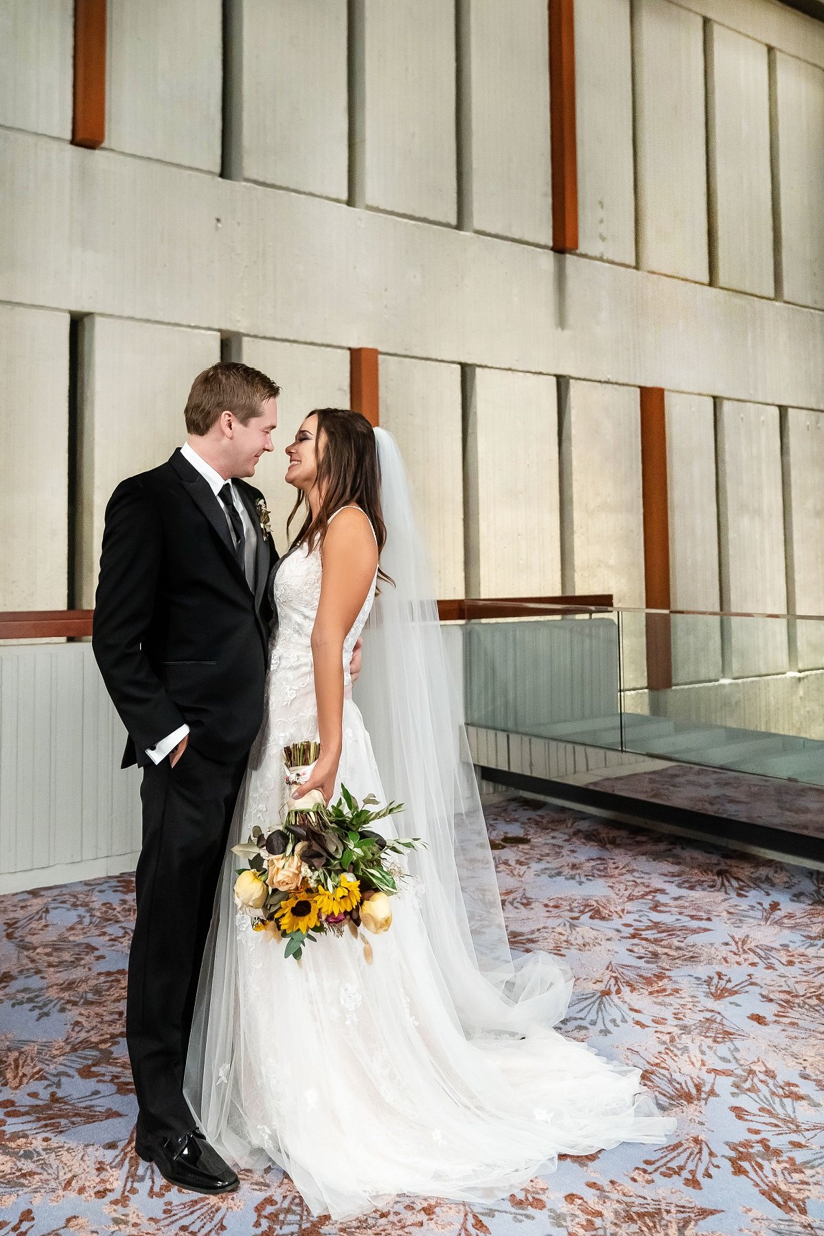 Erik Lake and Virginia Coombs smiling at each other on their wedding day on 'Married at First Sight'