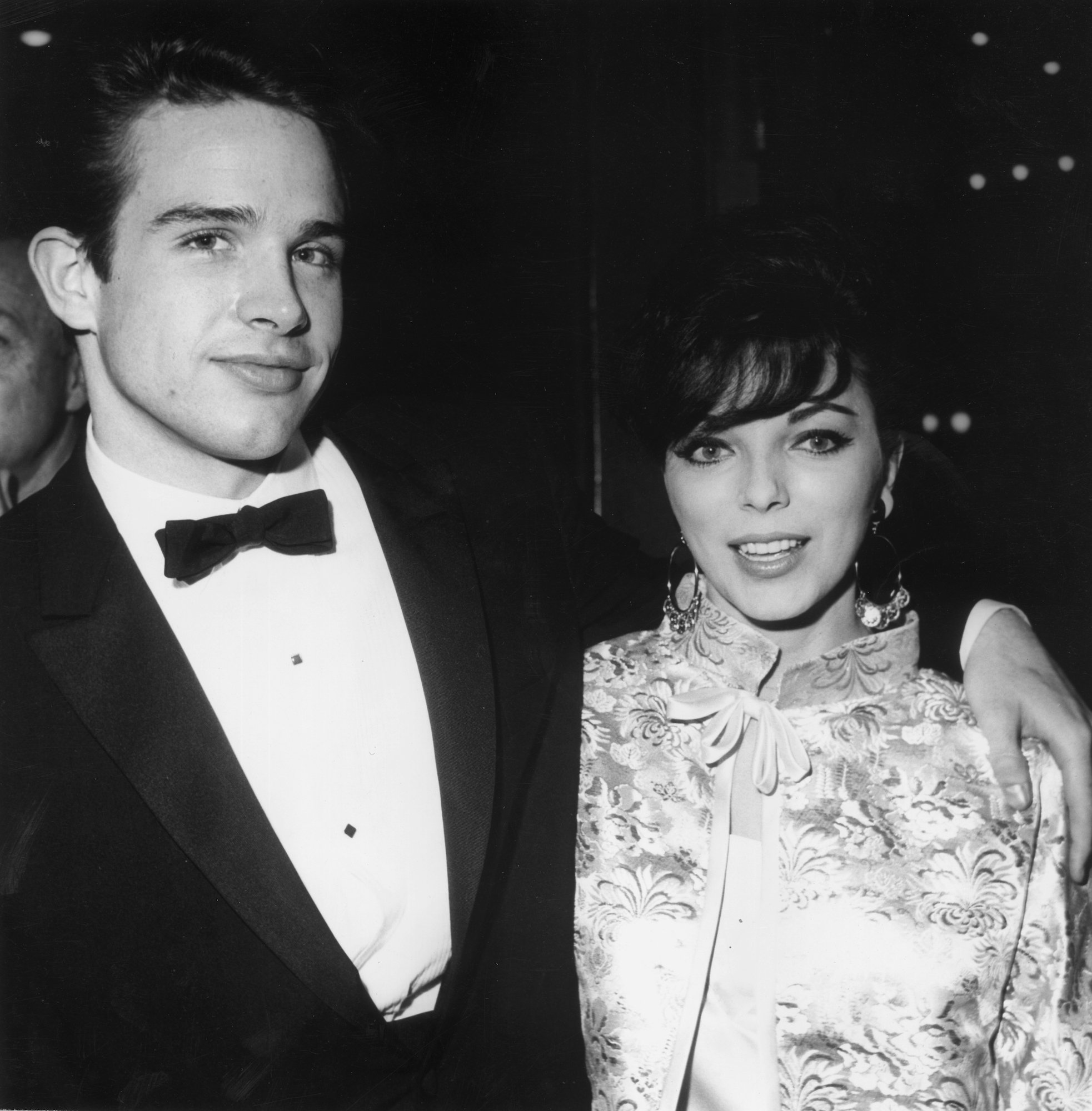 Warren Beatty and Joan Collins