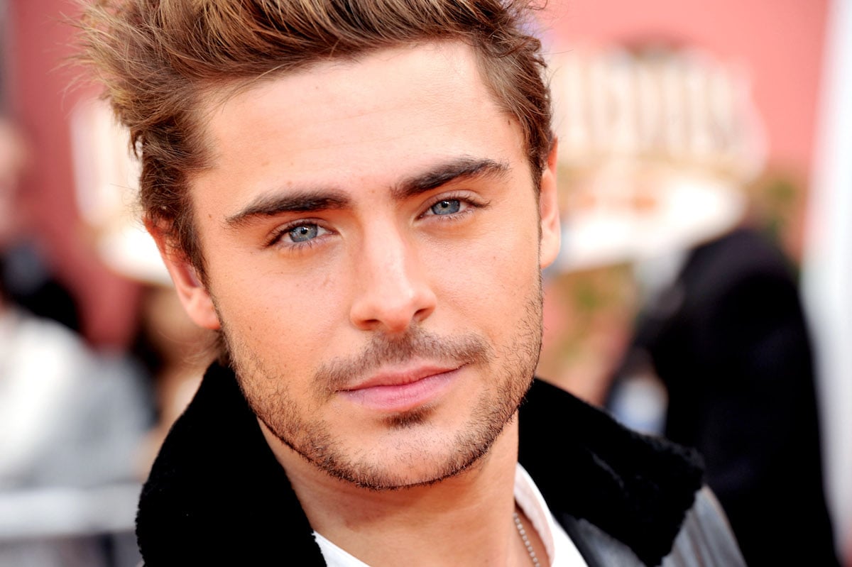 A closeup of Zac Efron's face