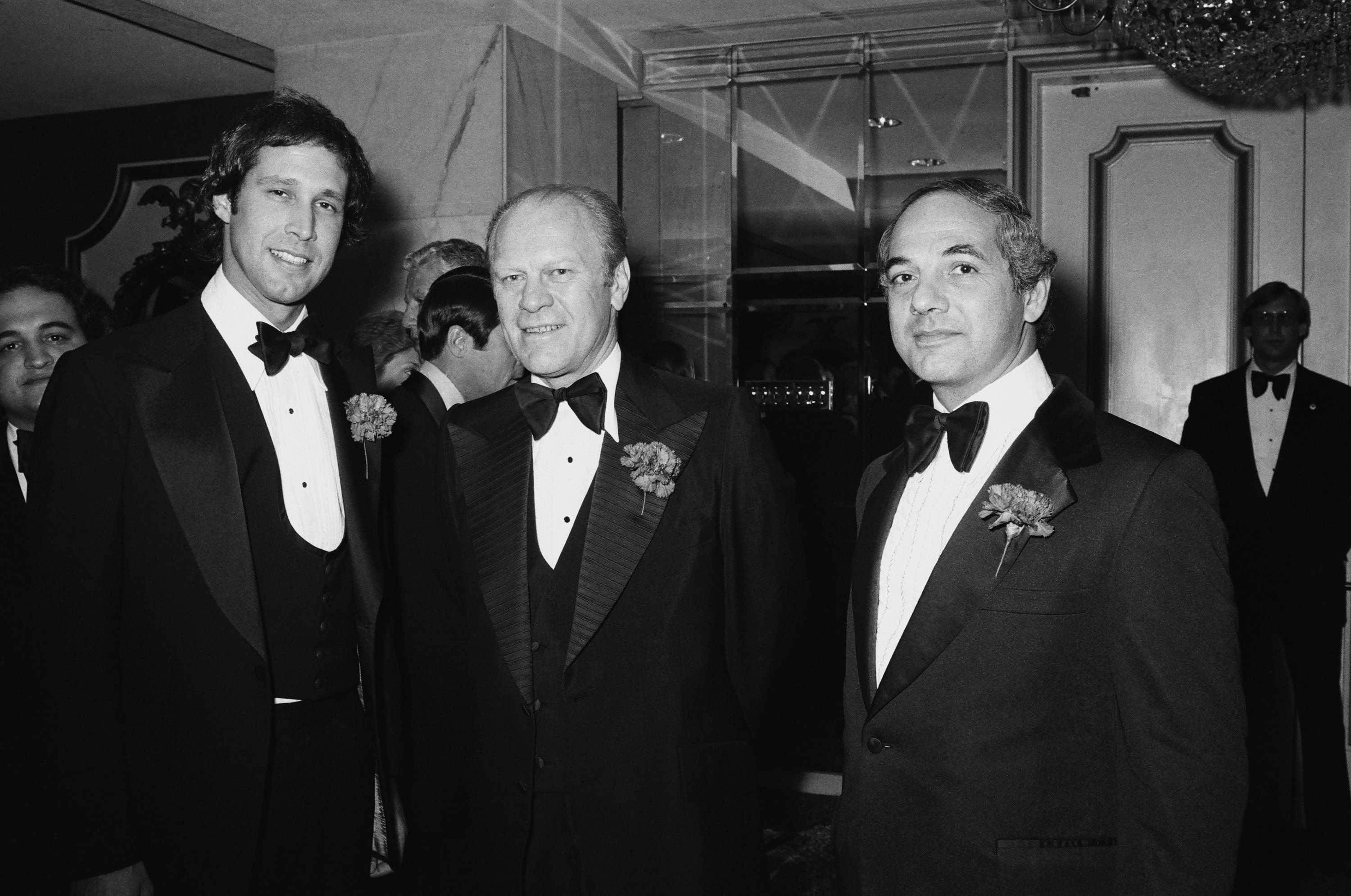 Black and white photo of 'Saturday Night Live's Chevy Chase and Gerald Ford.