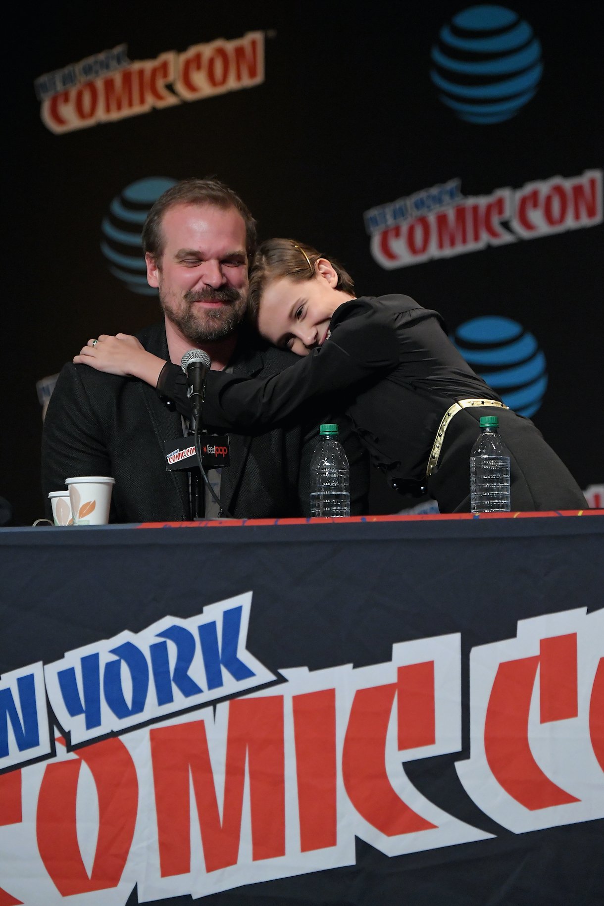 David Harbour and Millie Bobby Brown speak onstage at Inside the Upside Down in 2016