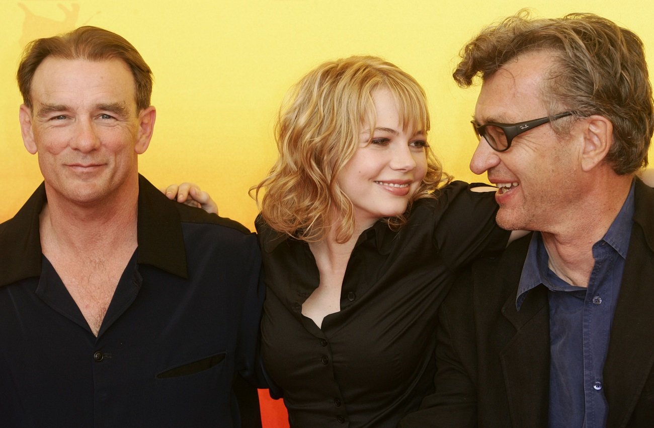 Diehl posing with Michelle Williams and Wim Wenders at 2004 Venice Film Festival