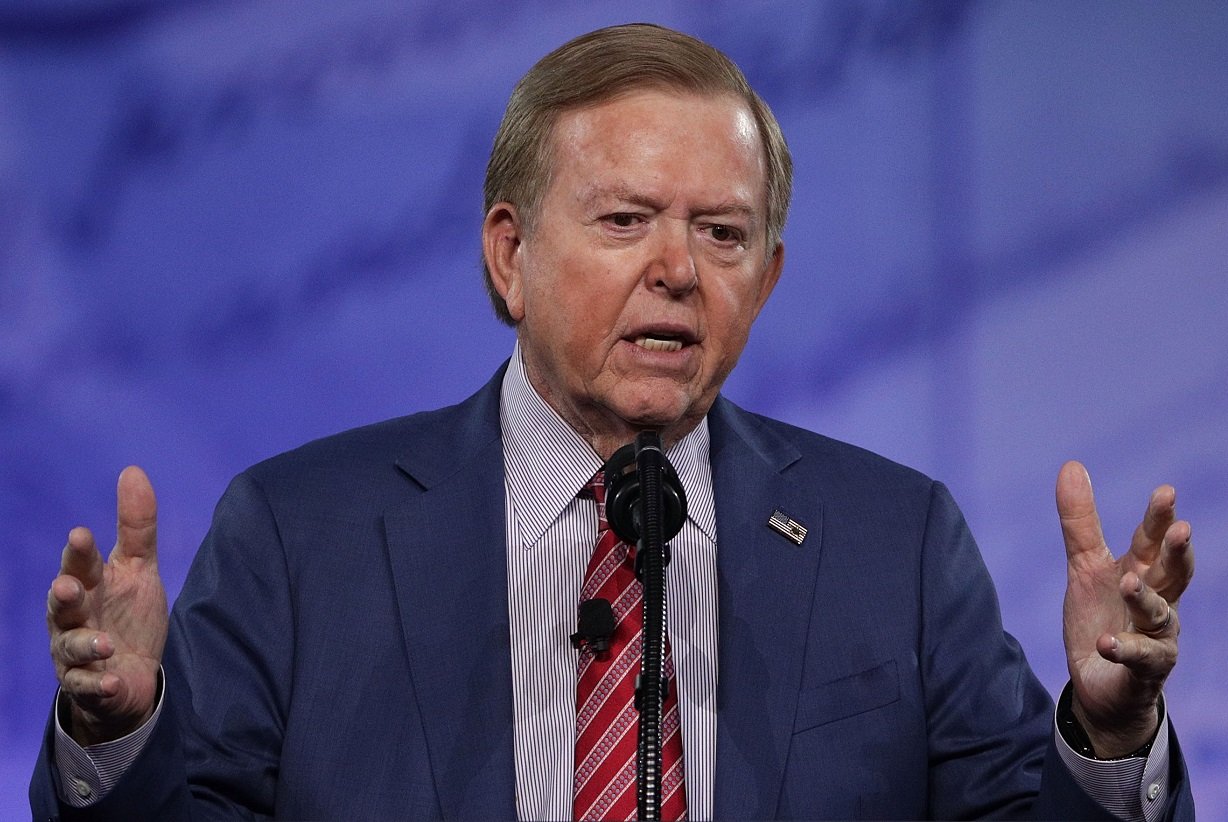 Lou Dobbs speaking at a conference in 2017