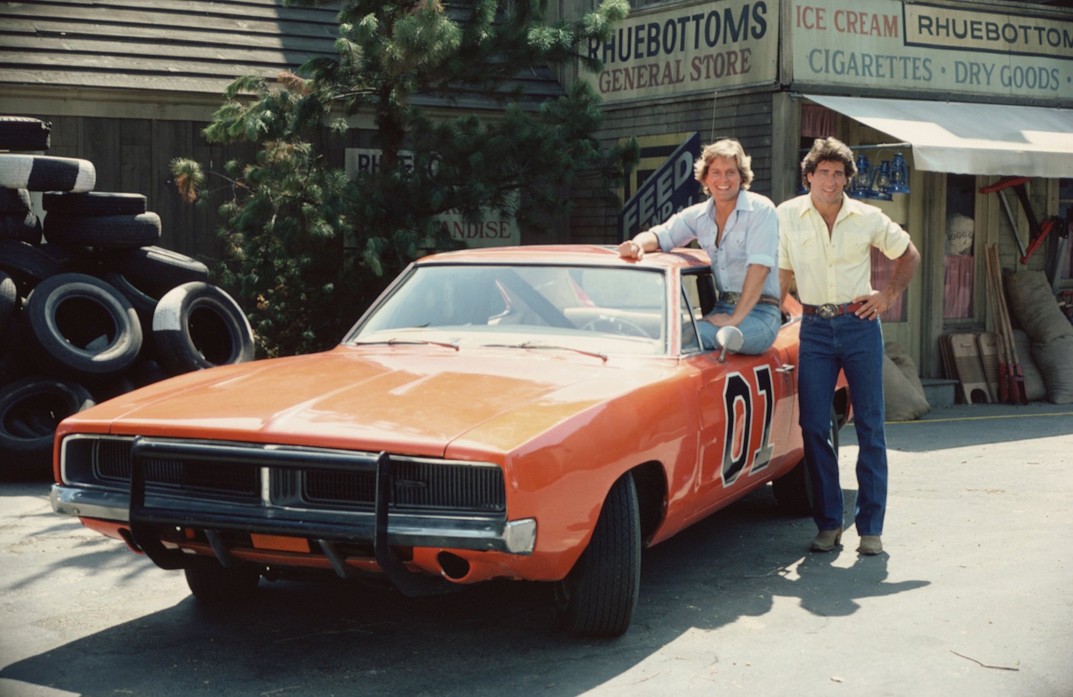Byron Cherry and Christopher Mayer pose with the iconic The Dukes of Hazzard car