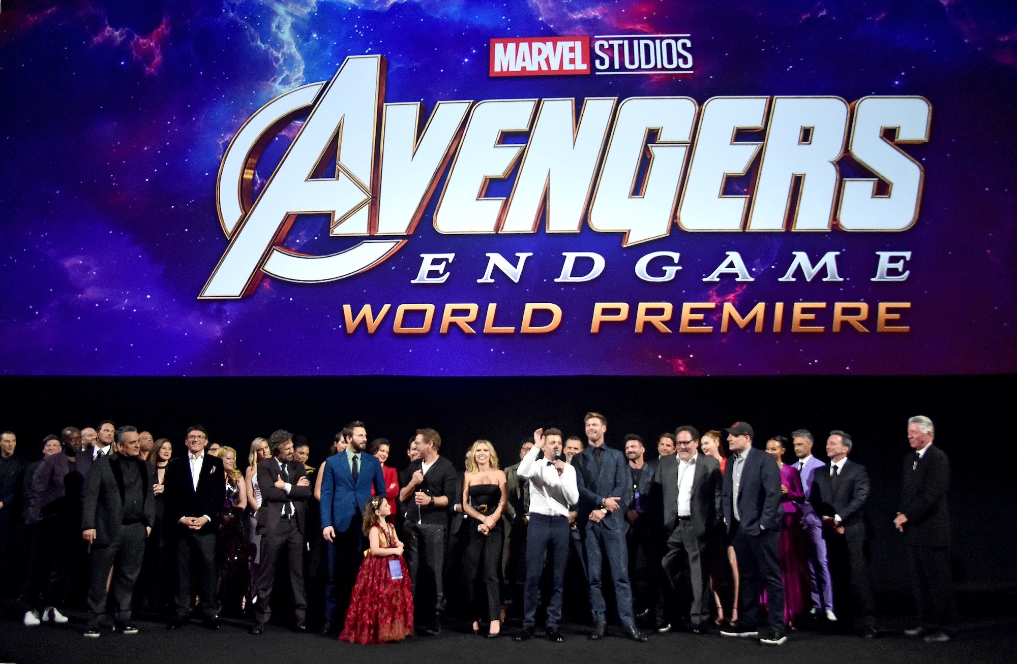 The cast and crew of Avengers: Endgame stands on the red carpet for a group photo.