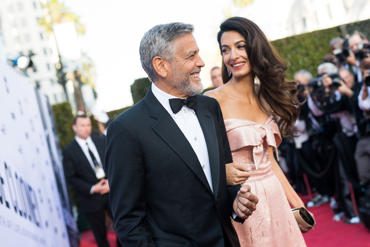 George Clooney and Amal Clooney walk the red carpet together at the American Film Institute's 46th Life Achievement Award Gala in 2018