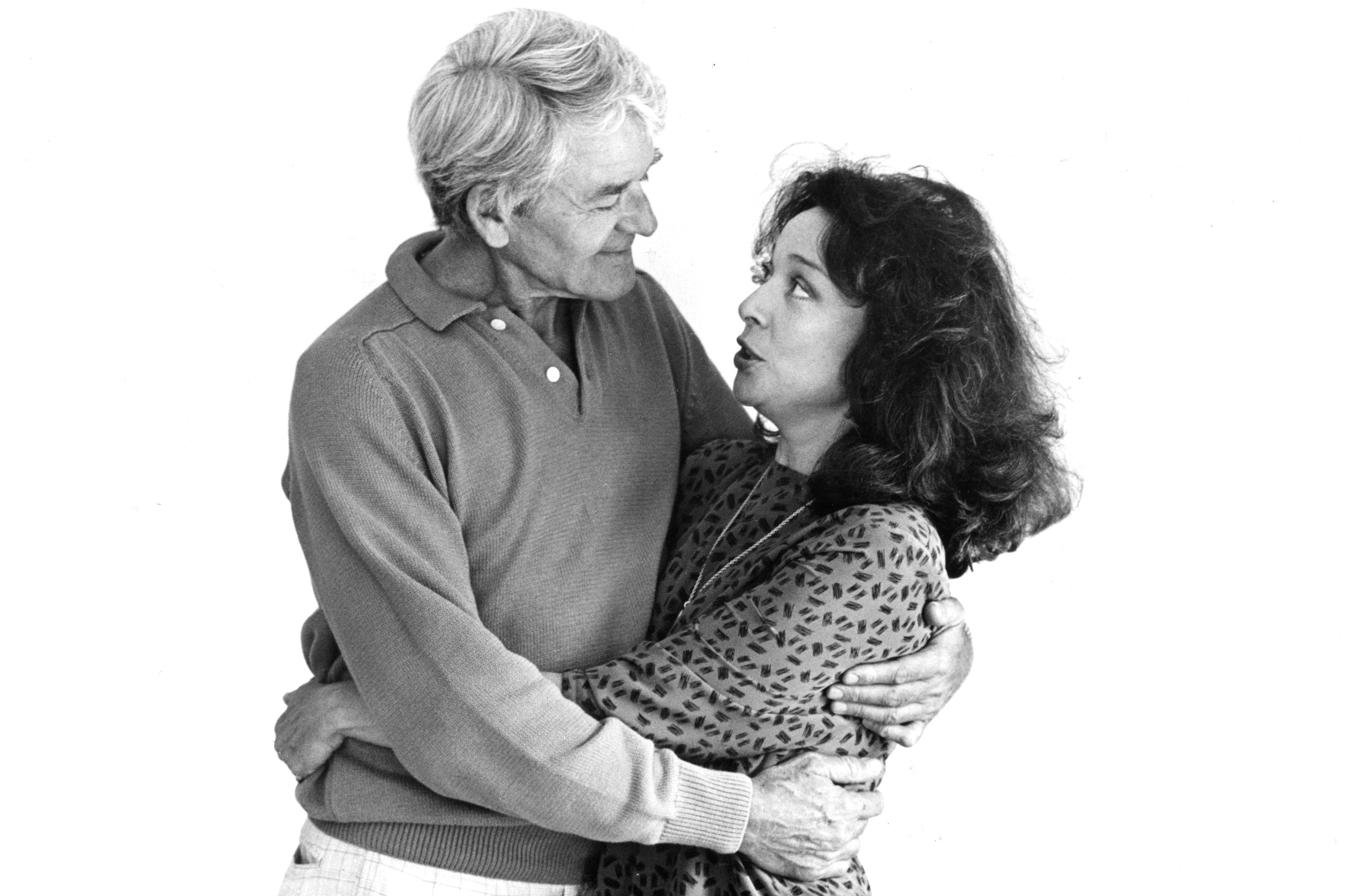 Hal Holbrook and Dixie Carter huggin