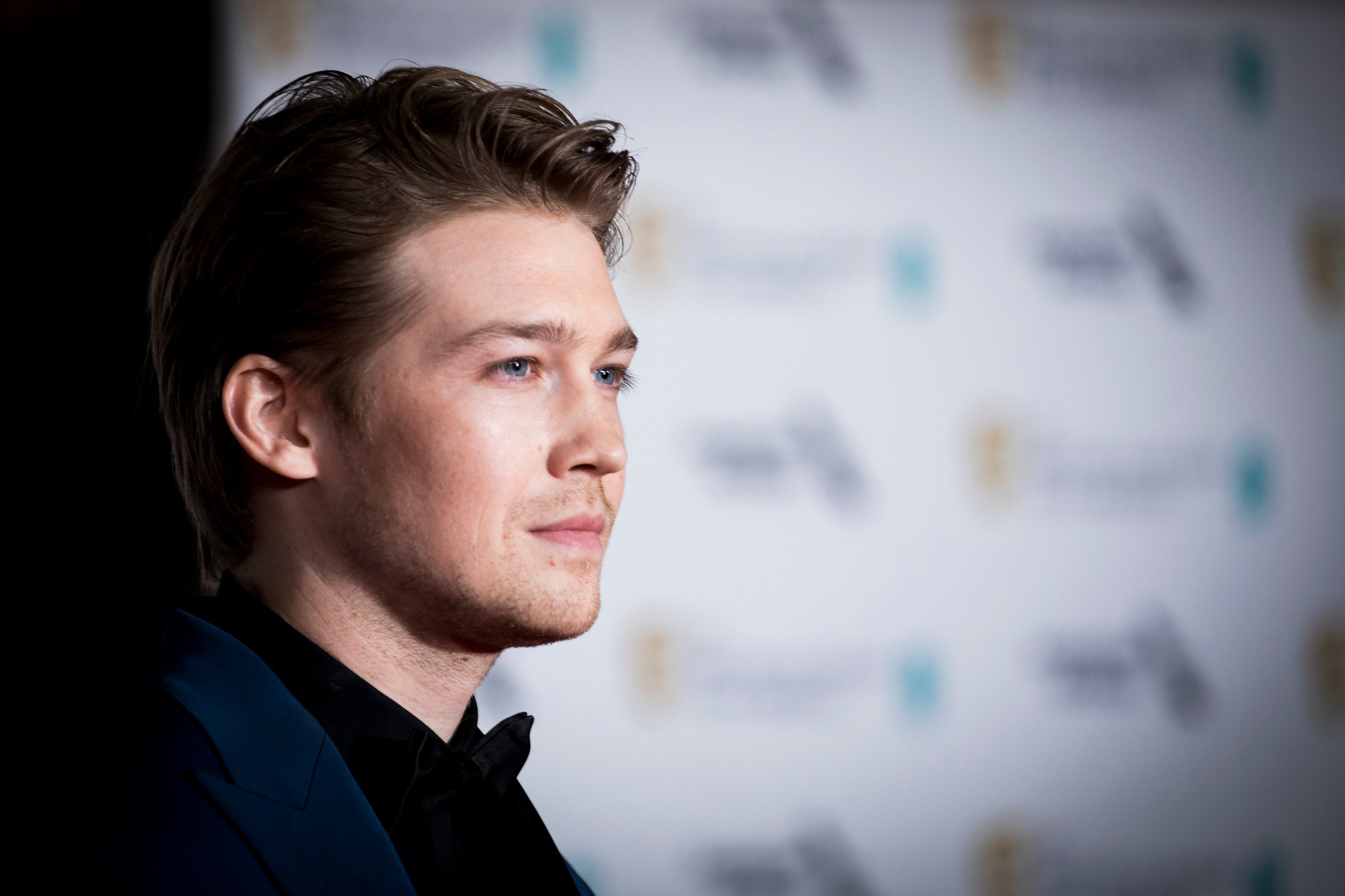 Joe Alwyn in profile as he attends the British Academy Film Awards in 2020