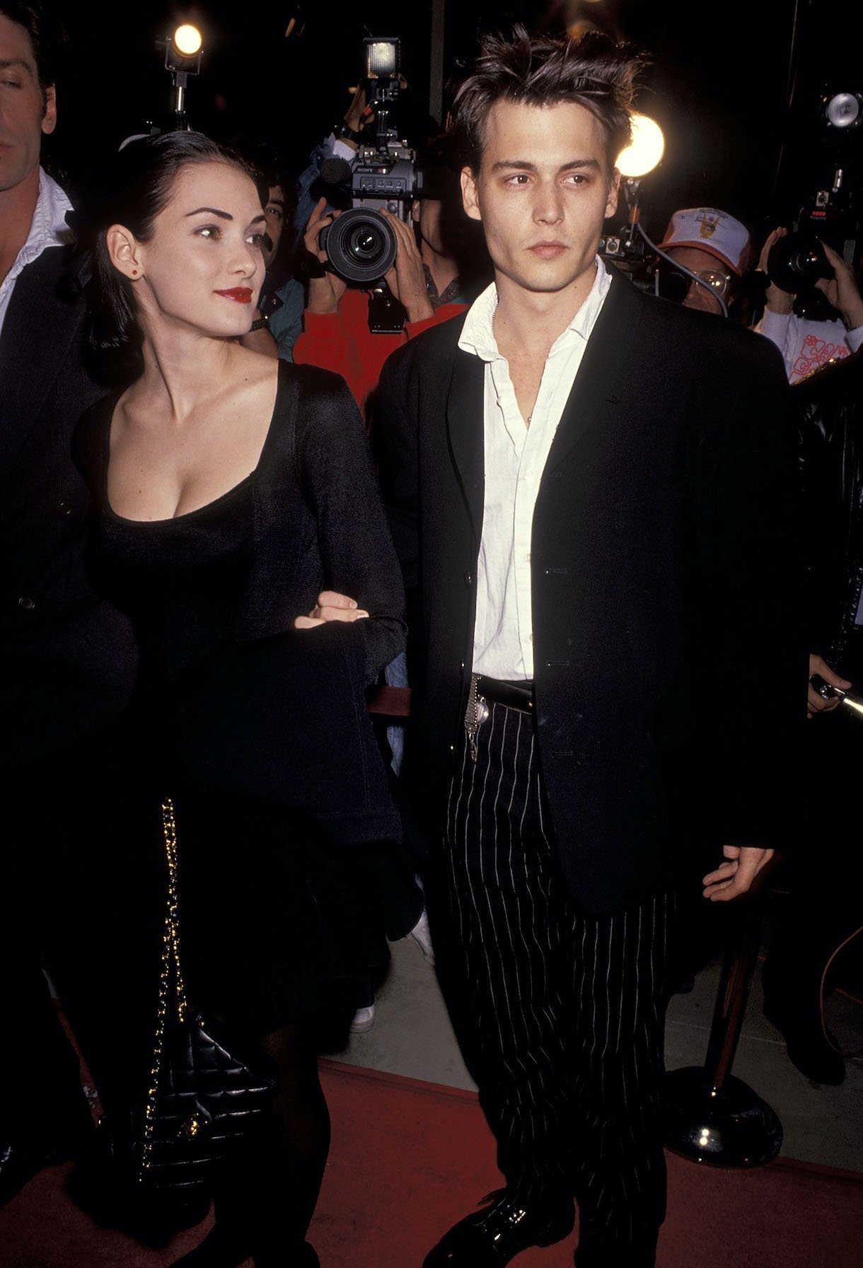 Actress Winona Ryder and actor Johnny Depp attend the 'Mermaids' Beverly Hills Premiere in 1990