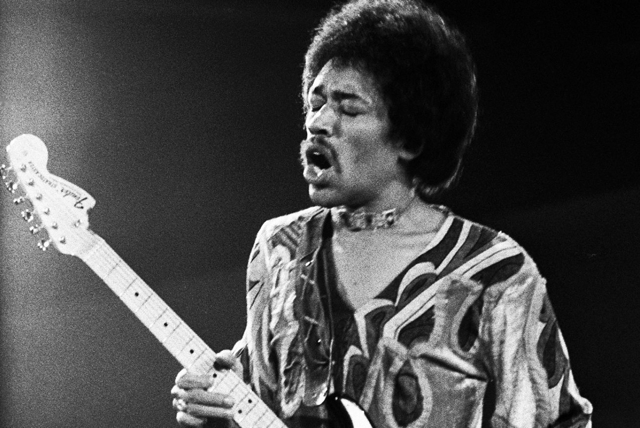 Jimi Hendrix on stage playing the guitar in 1970
