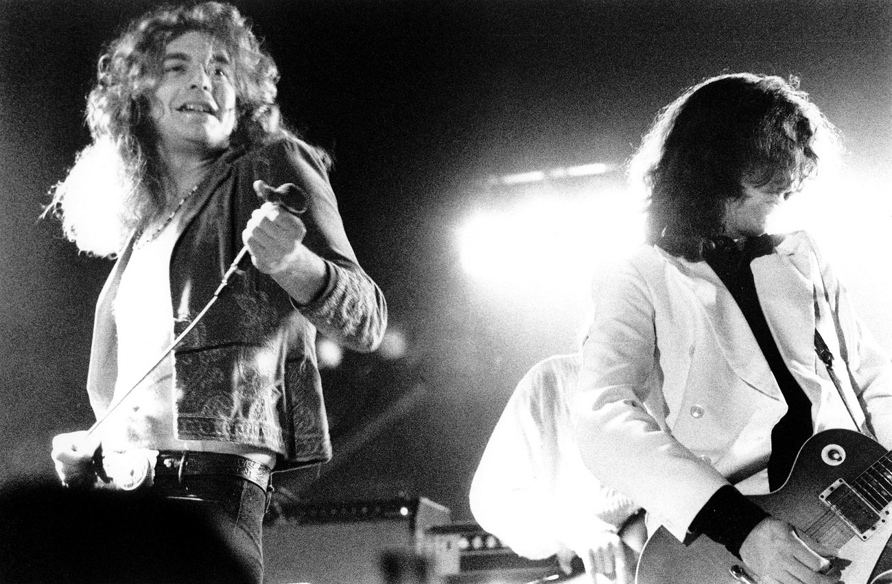 Robert Plant smiles on stage during a Led Zeppelin performance