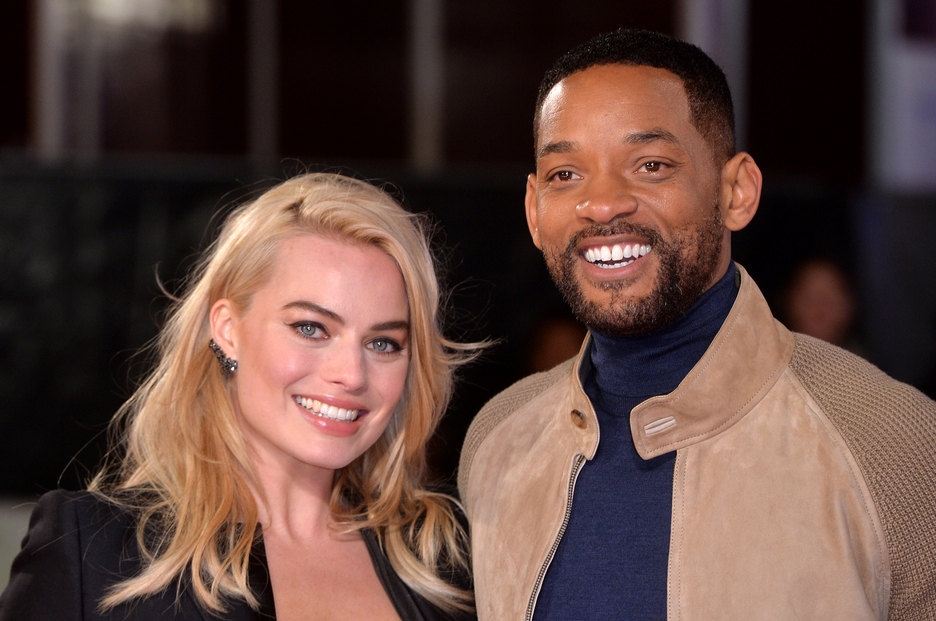 Margot Robbie and Will Smith smiling