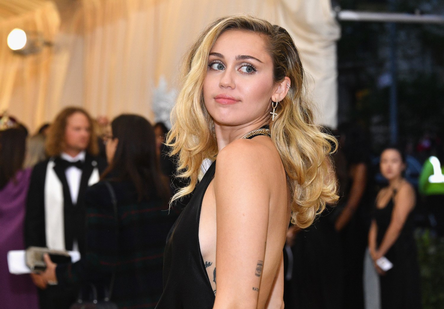 Miley Cyrus attends the Heavenly Bodies: Fashion & The Catholic Imagination Costume Institute Gala at The Metropolitan Museum of Art on May 7, 2018