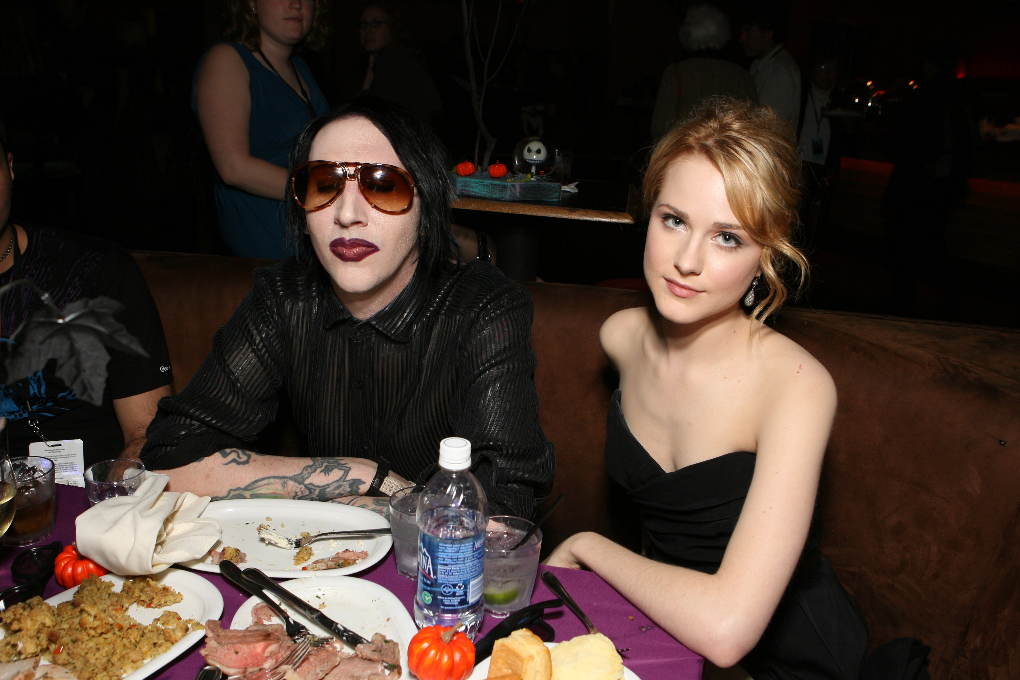 Marilyn Manson and Evan Rachel Wood at a table