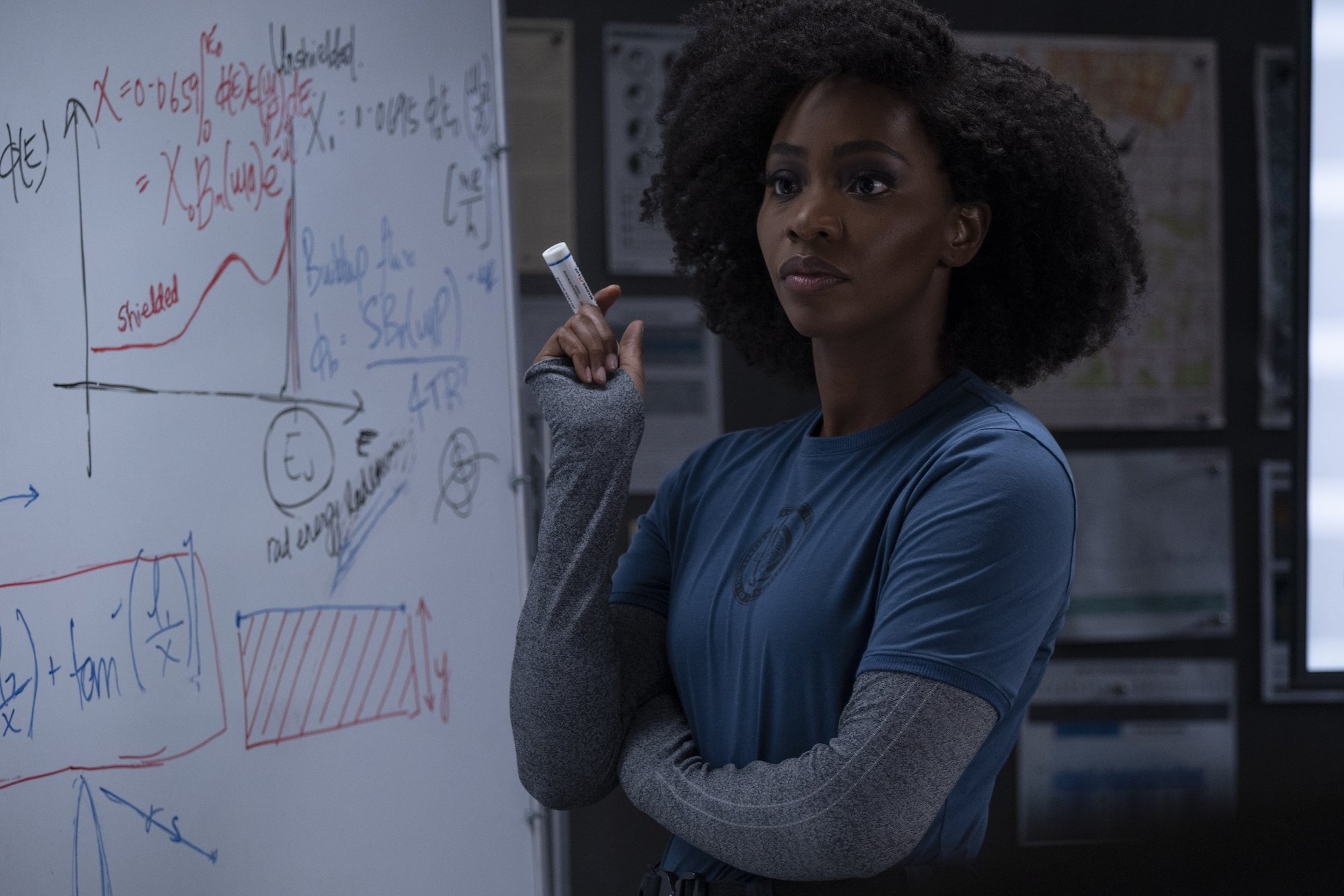 Teyonah Parris as Monica Rambeau standing in front of a white board in 'WandaVision'