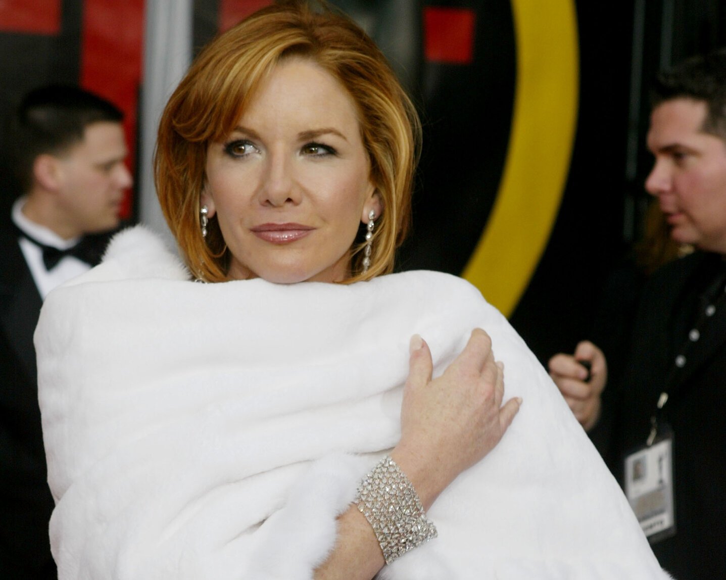 Melissa Gilbert in a fur shawl looking off to the right on the red carpet at the 10th Annual Screen Actors Guild Awards