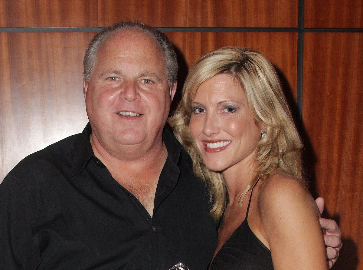 Rush Limbaugh and Kathryn Adams Limbaugh pose in all black