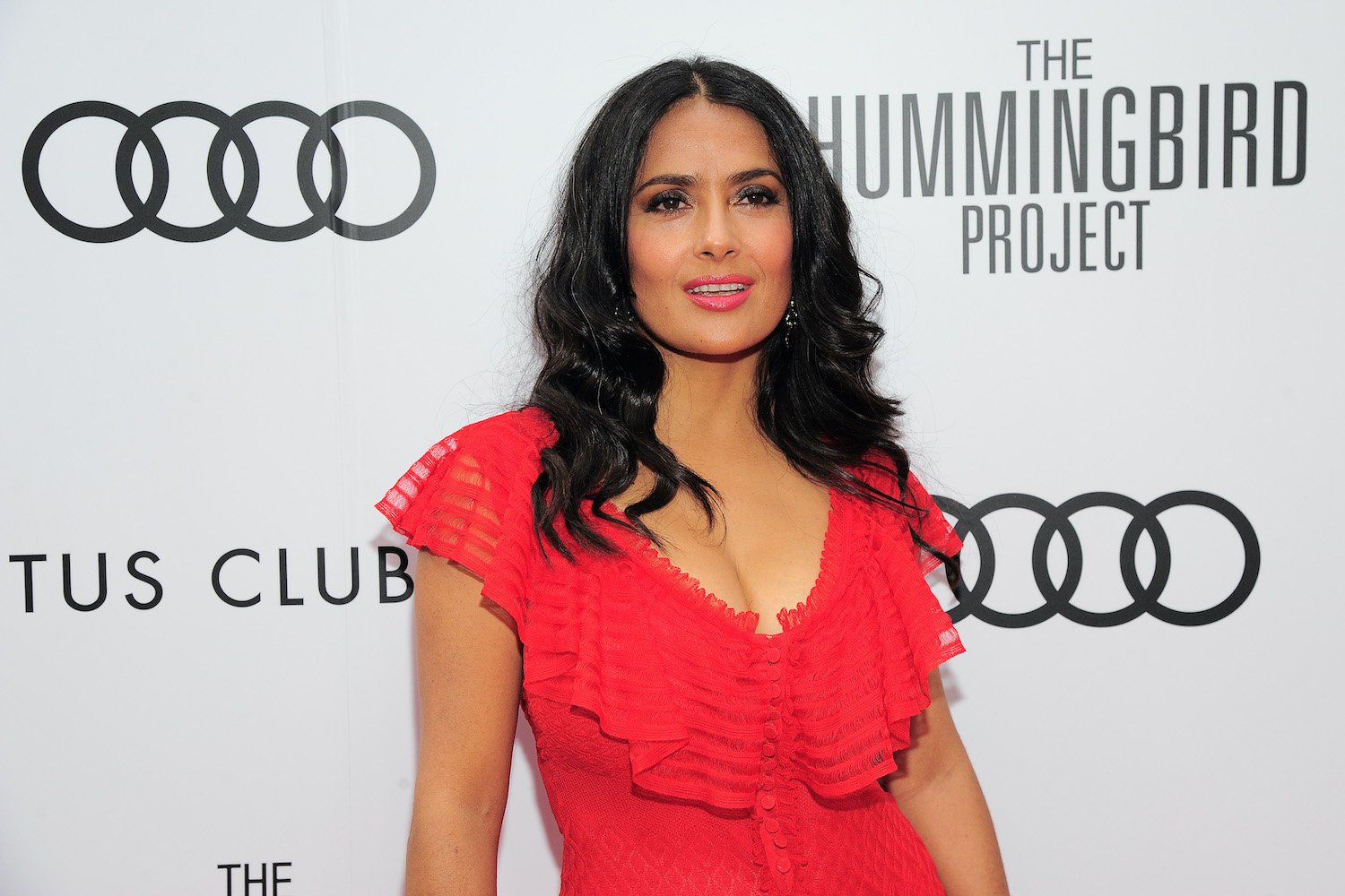 Salma Hayek attends Post-Screening Event For 'The Hummingbird Project' during the Toronto International Film Festival wearing a red dress