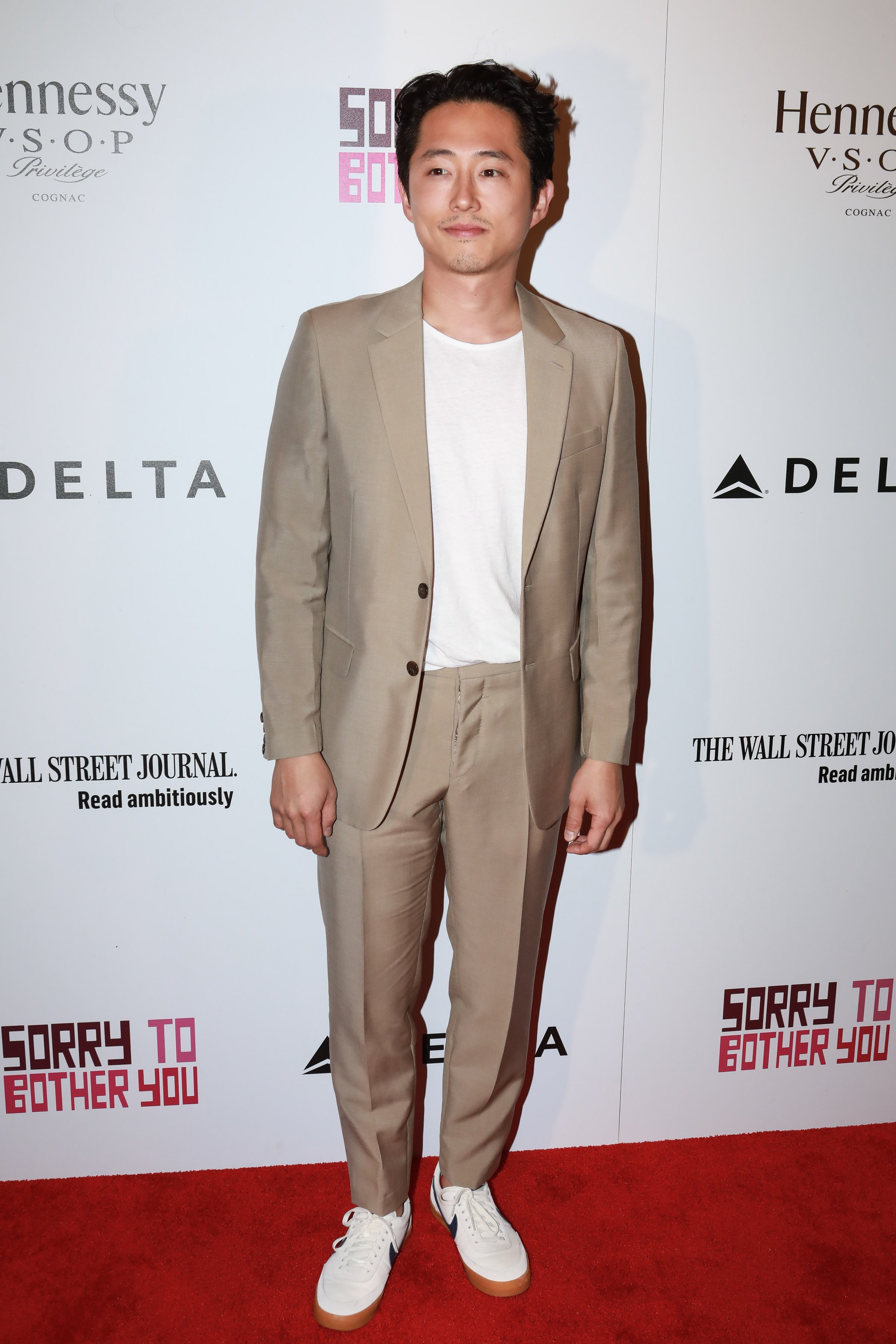 Steven Yeun on the red carpet