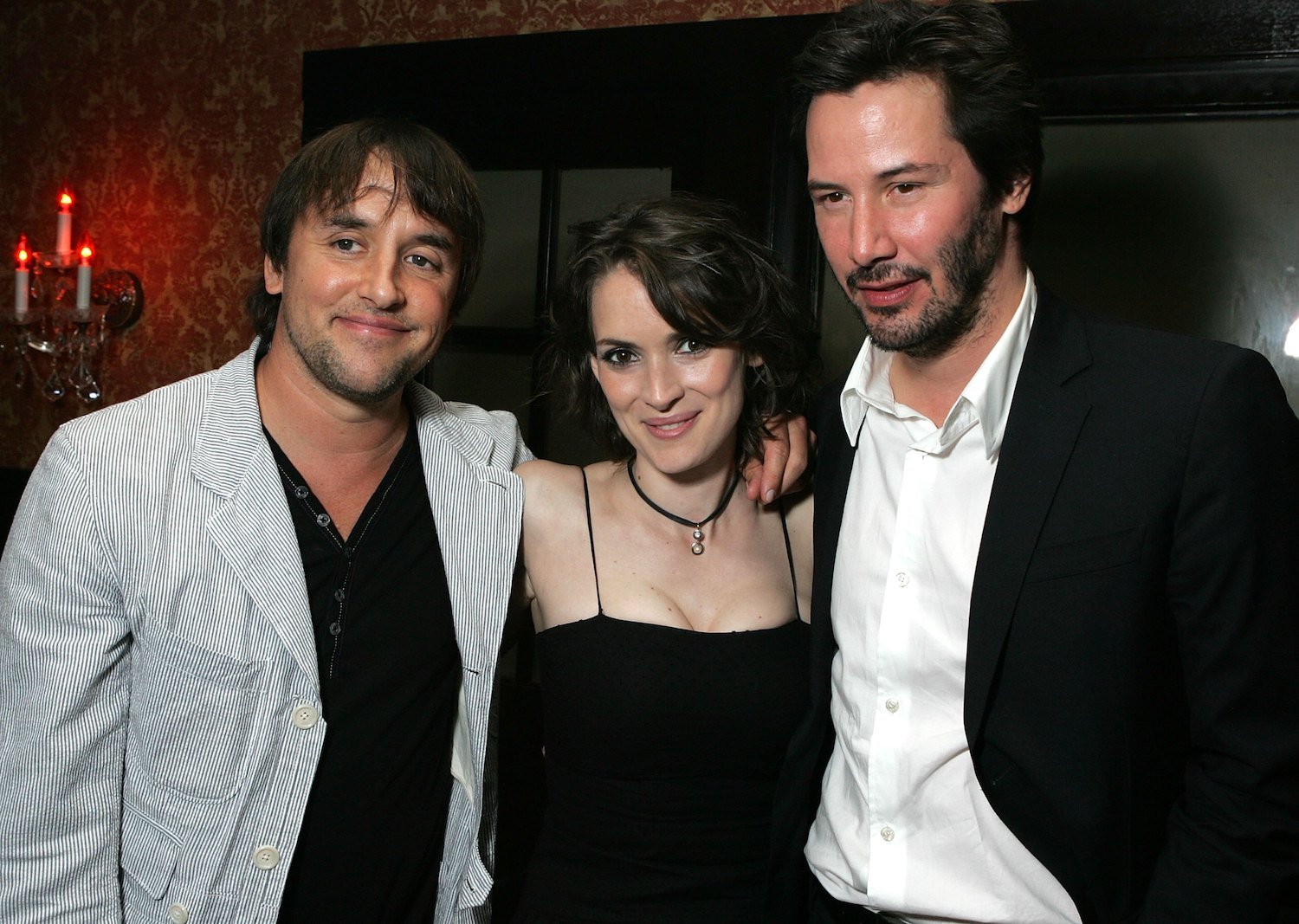 Winona Ryder, Keanu Reeves with Richard Linklater at the Los Angeles premiere after party of 'A Scanner Darkly' 