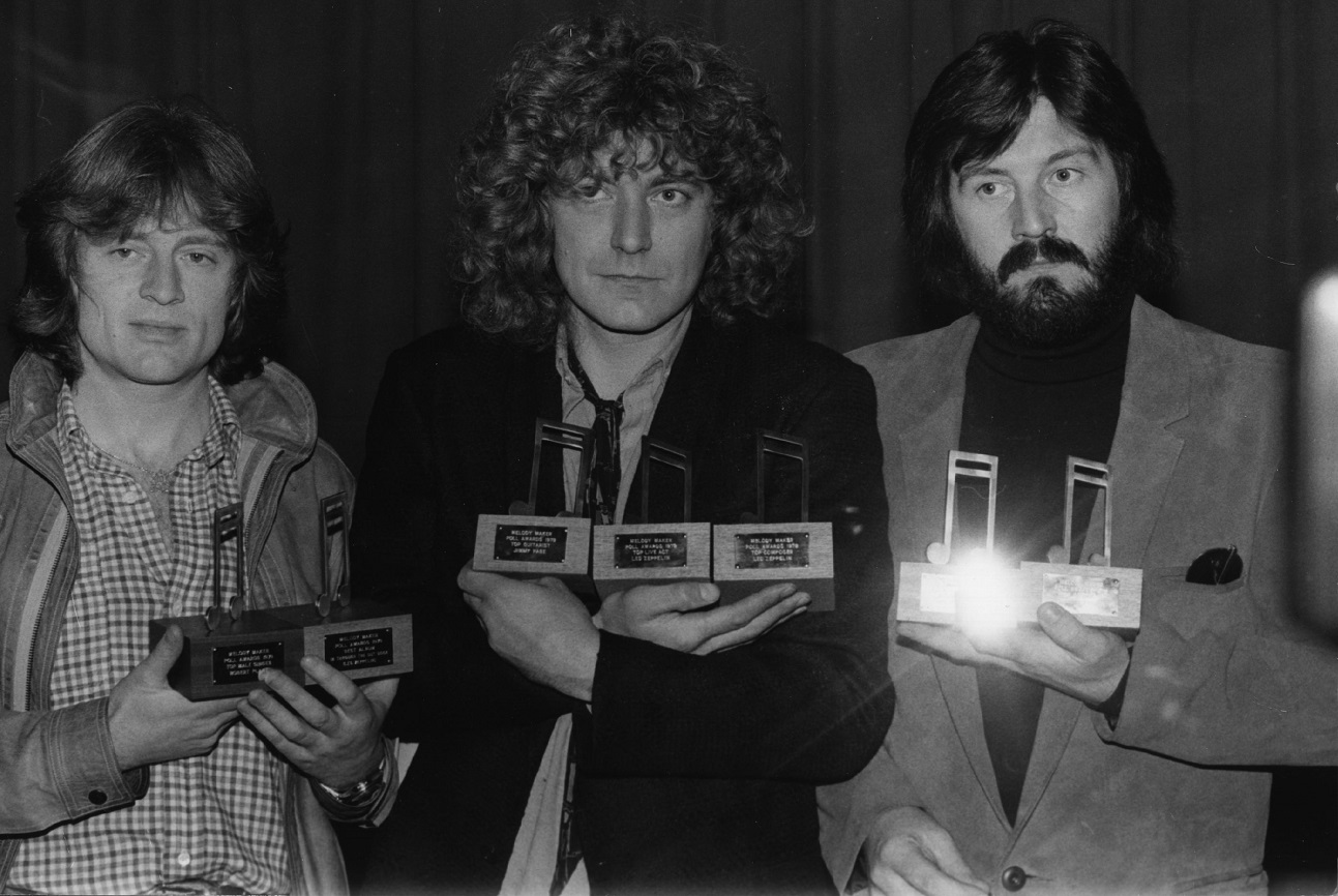 Members of Led Zeppelin pose with awards