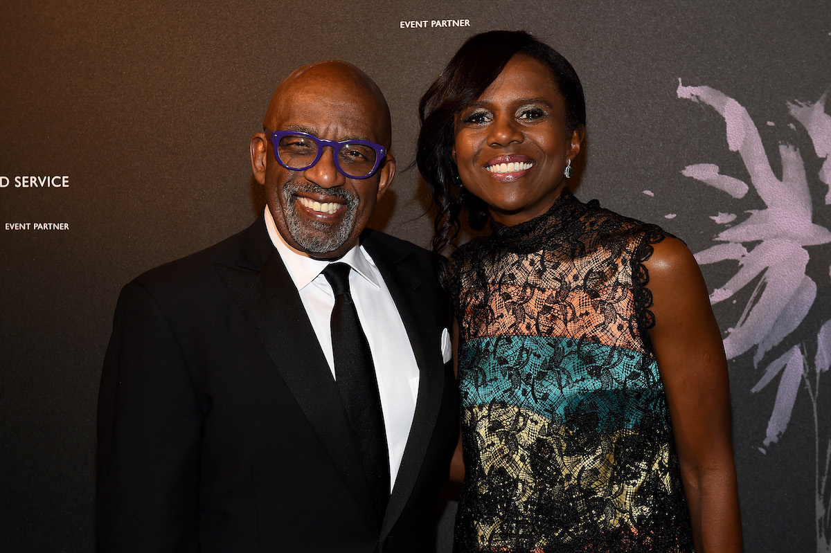 Al Roker and Deborah Roberts smiling on the red carpet