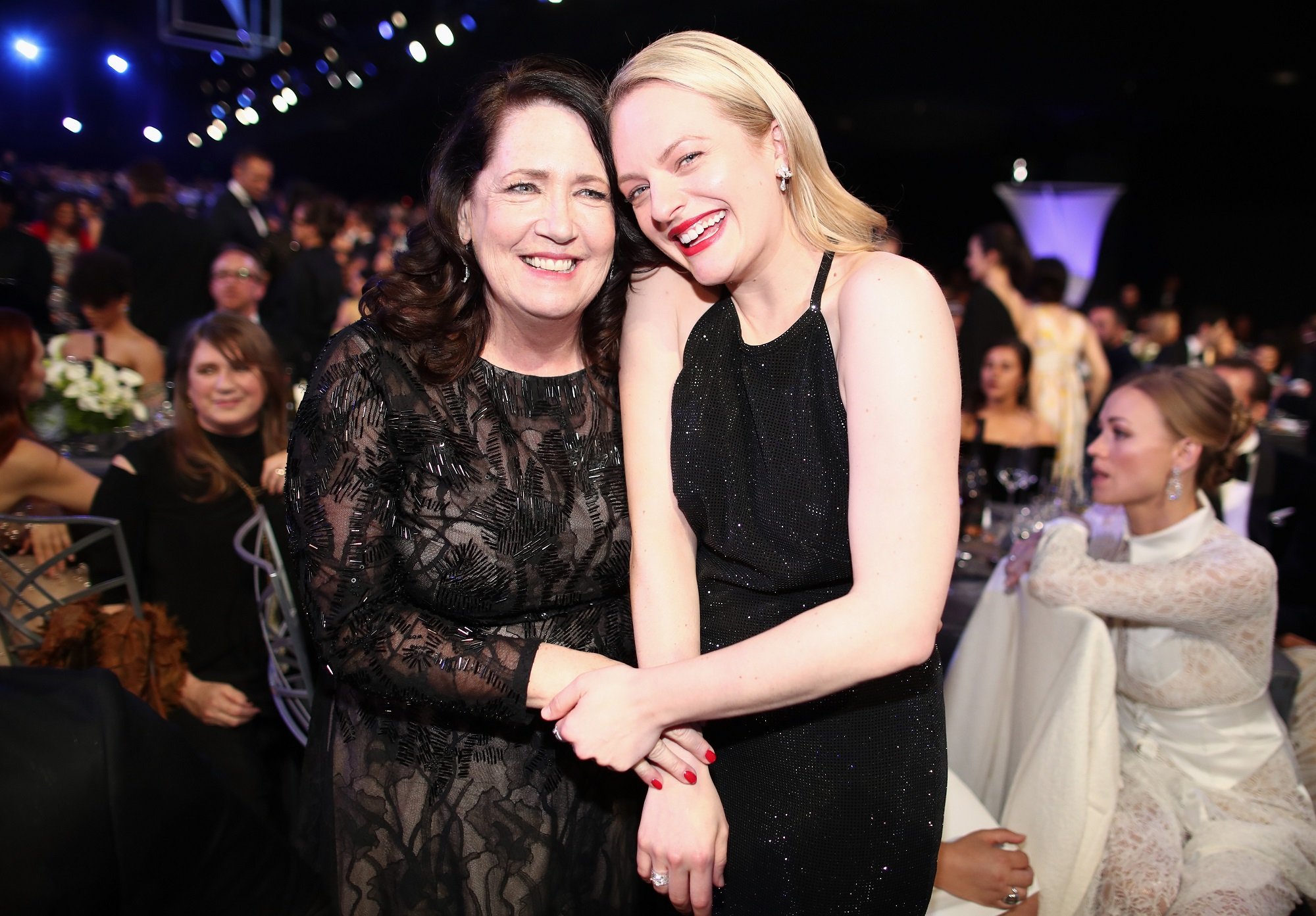 Ann Dowd and Elisabeth Moss hug at the 24th Annual Screen Actors Guild Awards in 2018