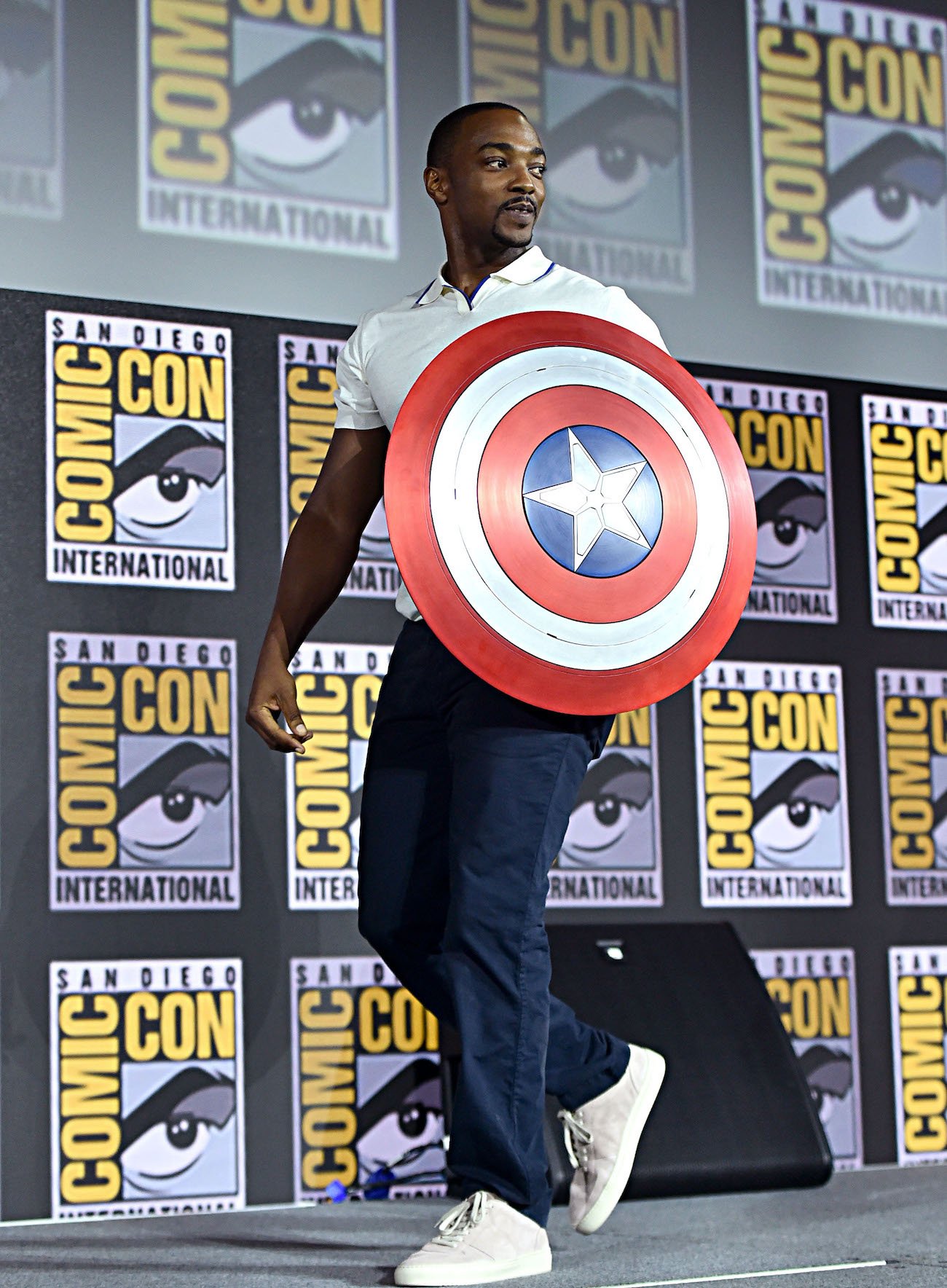 Anthony Mackie holding the Captain America shield