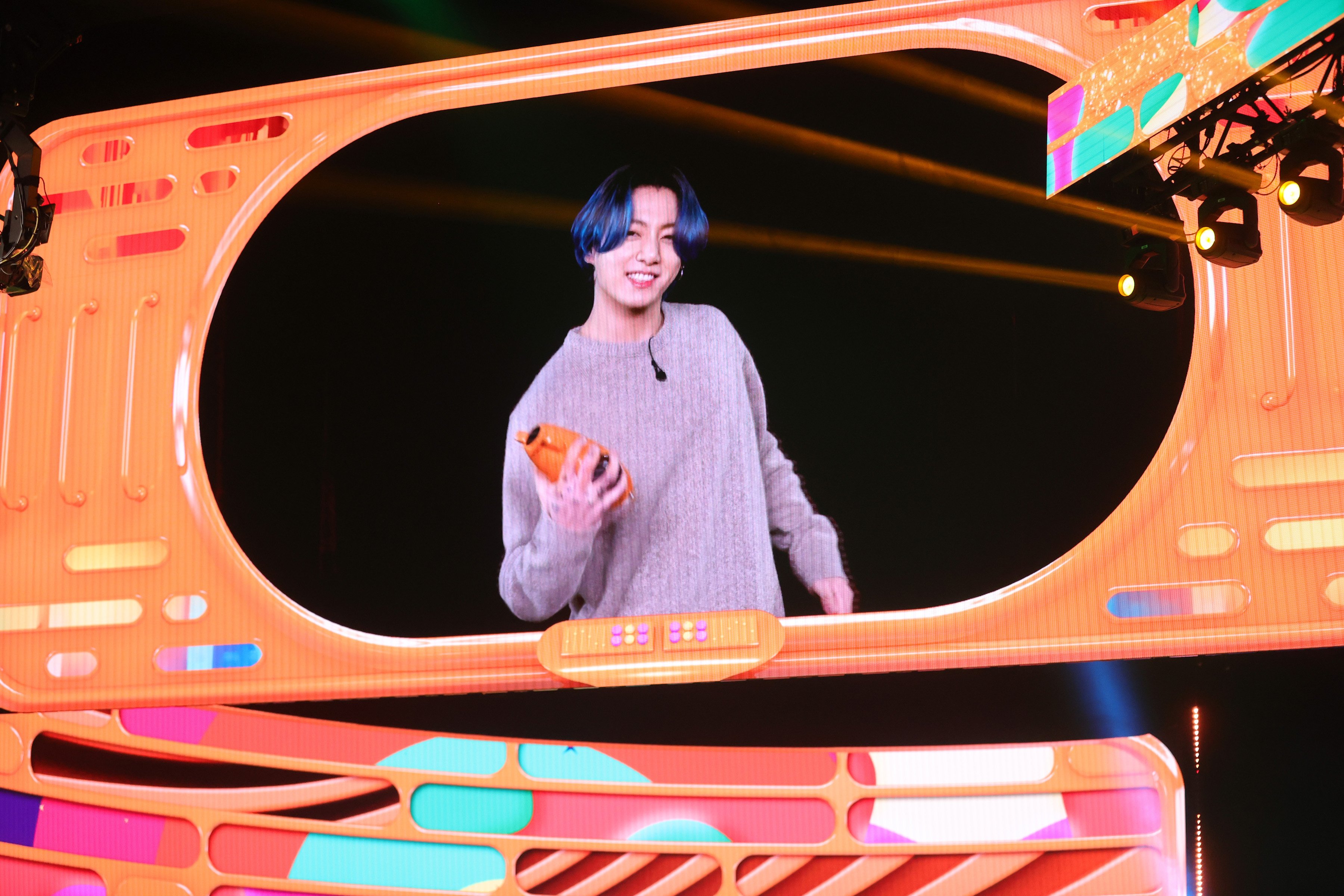 Blue Hair Jungkook of BTS, winner of Favorite Music Group, is seen on screen during Nickelodeon's Kids' Choice Awards