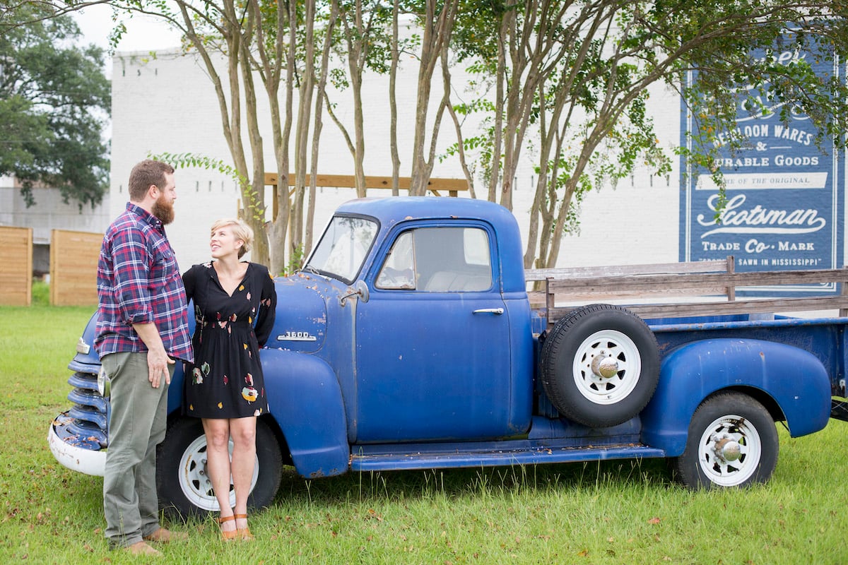 Ben and Erin Napier pose in their hometown of Laurel Mississippi